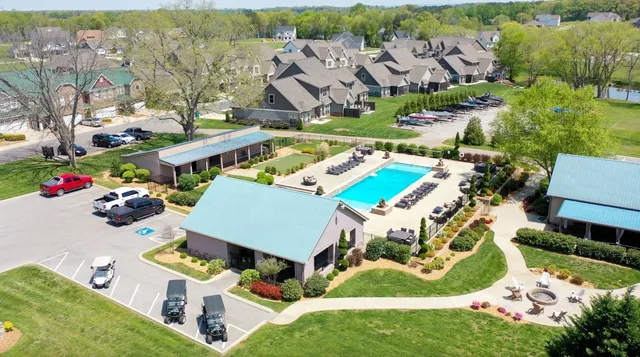 a view of an house with backyard porch and sitting area