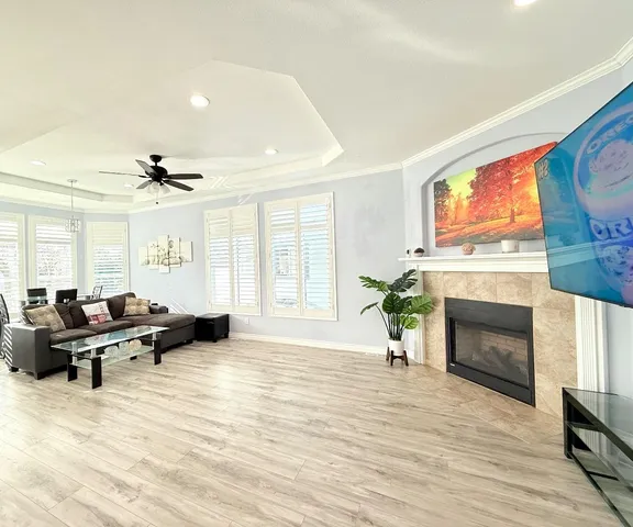 a living room with furniture window and fireplace