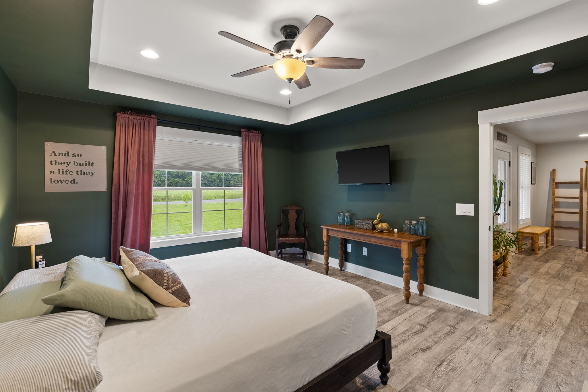 4476 Beards Chapel Road Springfield, TN 37172 - Photo 22 of 62 a bedroom with a bed and a chandelier