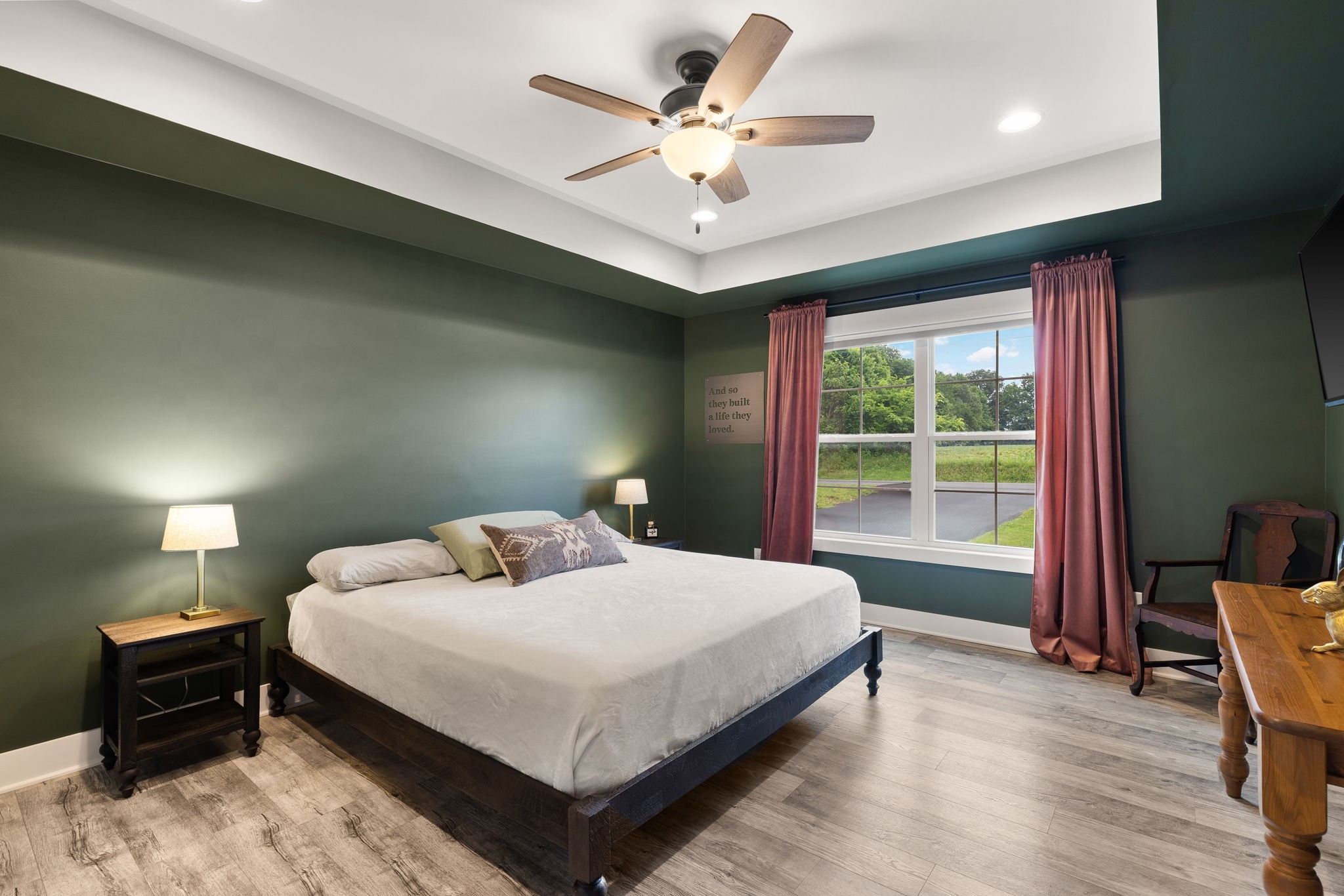 4476 Beards Chapel Road Springfield, TN 37172 - Photo 23 of 62 a bedroom with a bed and a chandelier