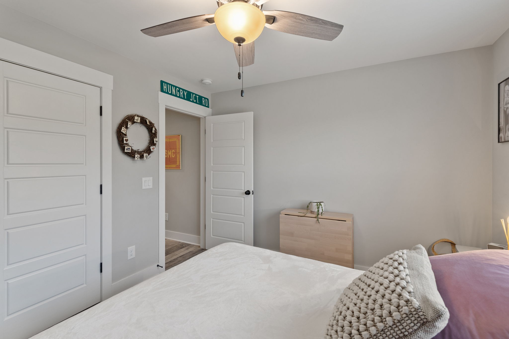 4476 Beards Chapel Road Springfield, TN 37172 - Photo 28 of 62 a bedroom with a bed and a chandelier