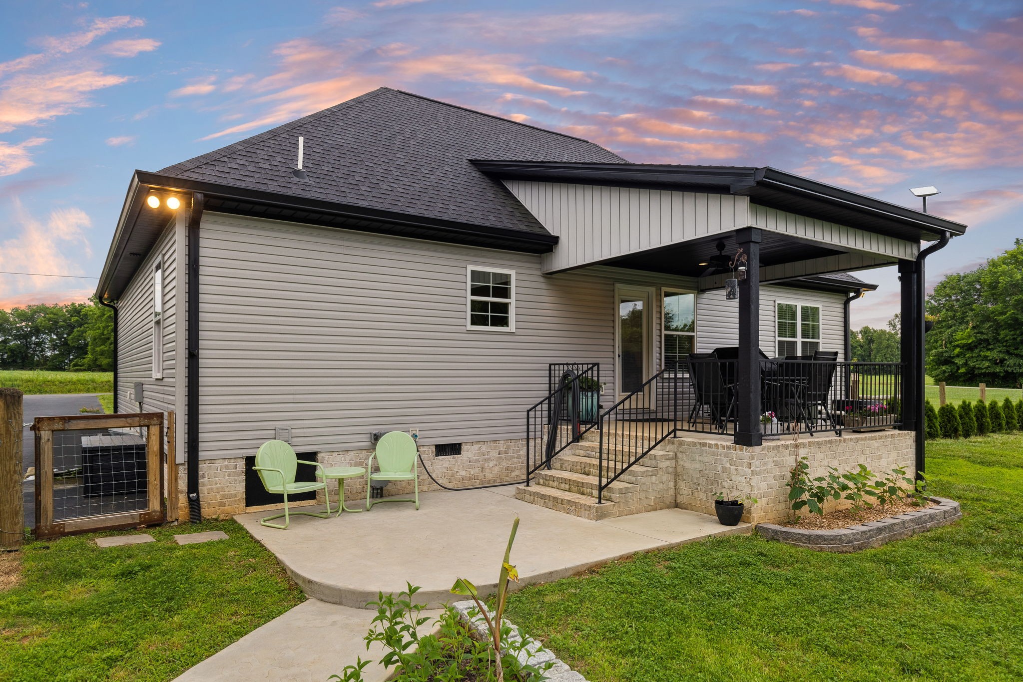 4476 Beards Chapel Road Springfield, TN 37172 - Photo 34 of 62 a front view of house with a garden and patio