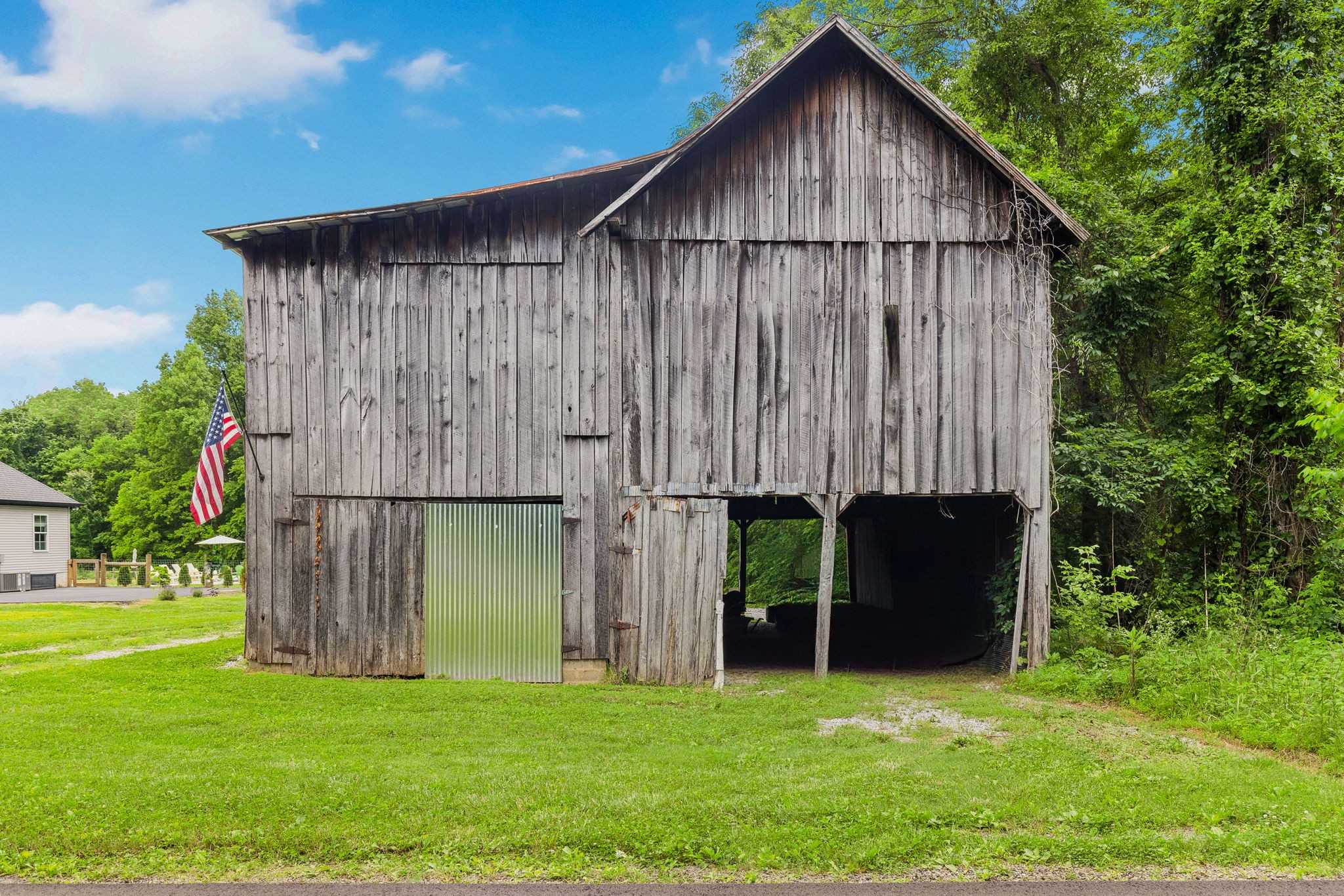 4476 Beards Chapel Road Springfield, TN 37172 - Photo 50 of 62 a view of a small barn with a small yard