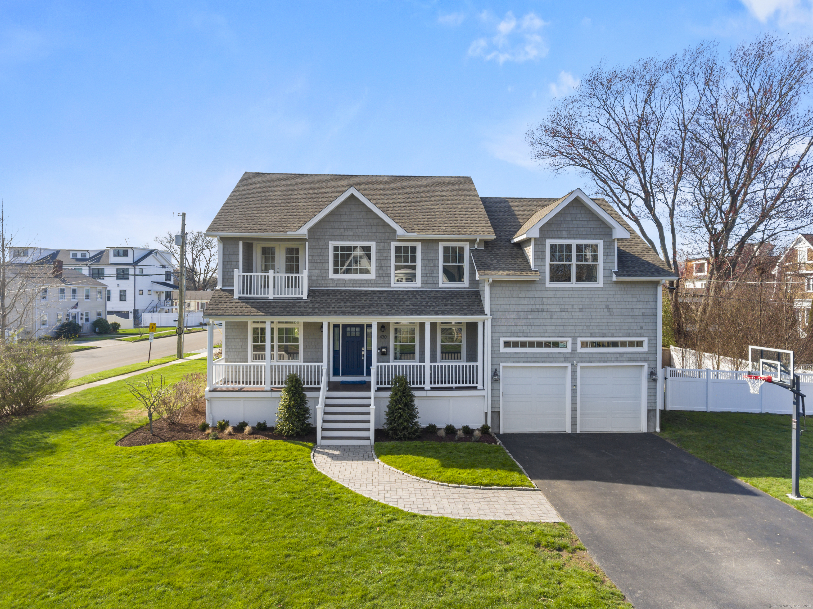 430 Edward Street Fairfield, CT 06824 - Photo 1 of 1 a front view of a house with a yard