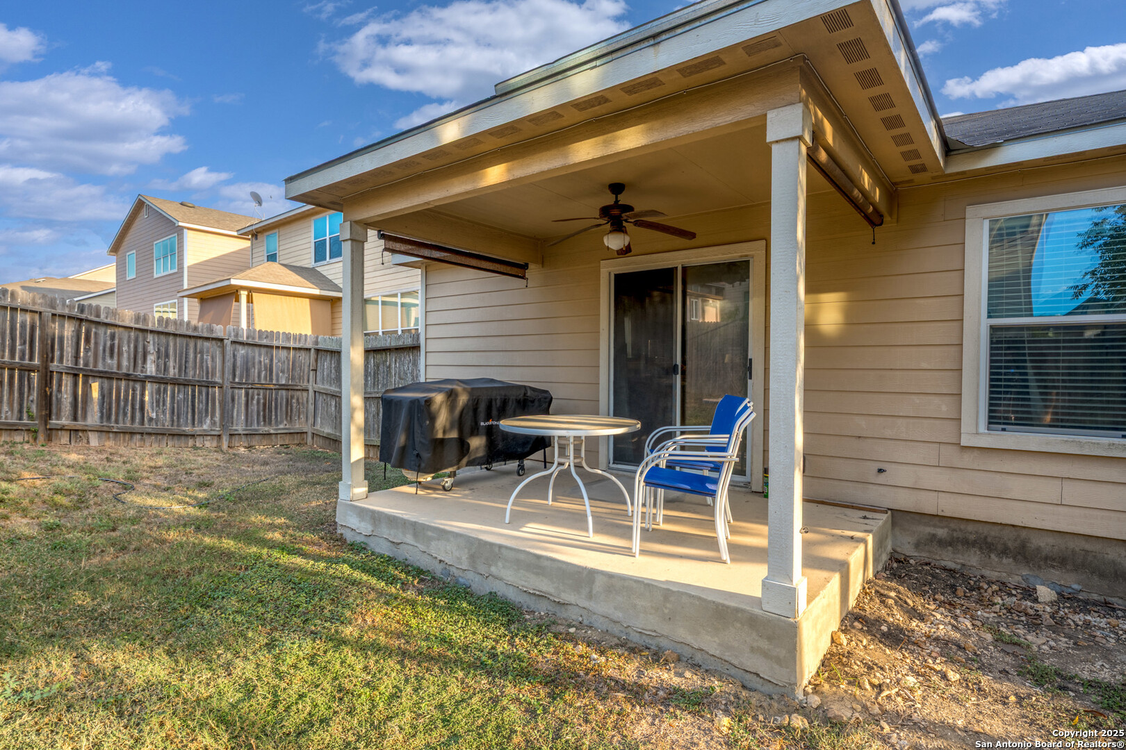 9419 Copper Mist Converse, TX 78109 - Photo 25 of 25 a view of a backyard with a patio and a garden