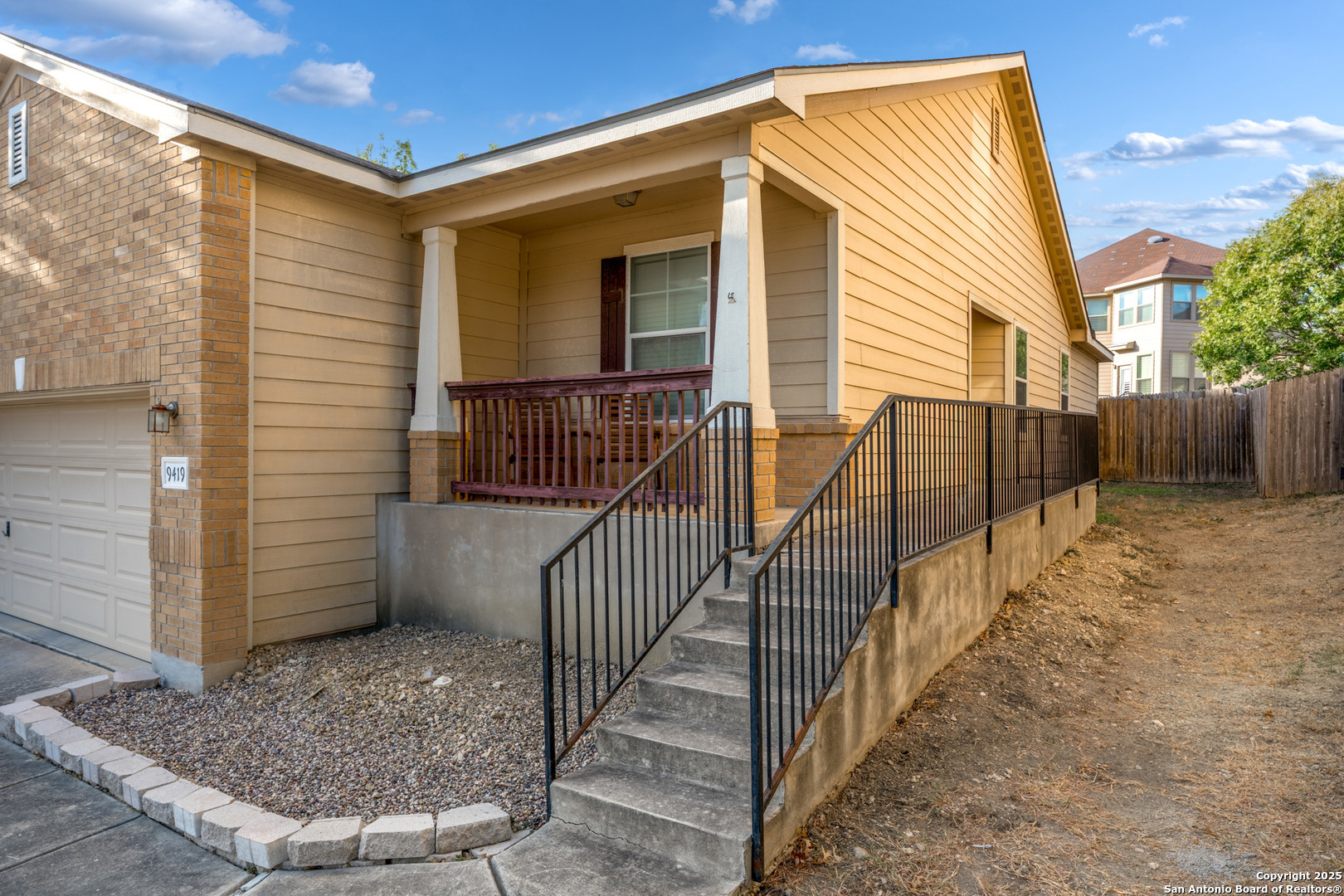 9419 Copper Mist Converse, TX 78109 - Photo 4 of 25 a view of house with wooden floor and large windows
