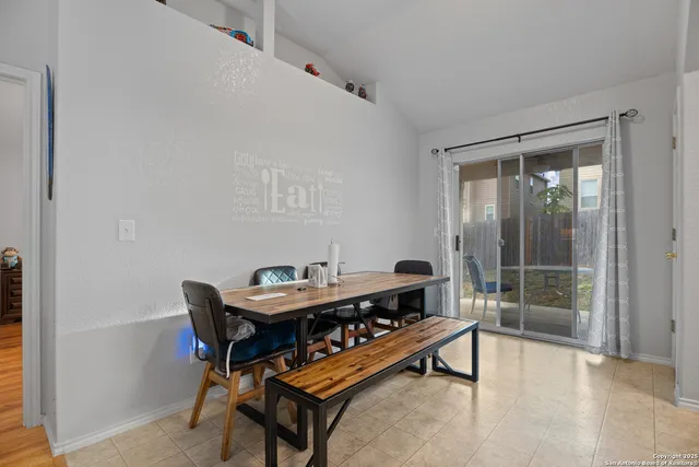 a reading room with furniture and wooden floor