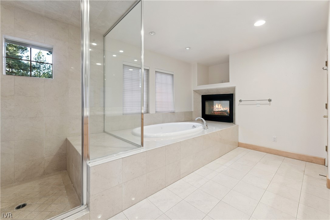 1057 Sawmill Road Incline Village, NV 89451 - Photo 25 of 48 Spacious primary suite features a spa-inspired ens