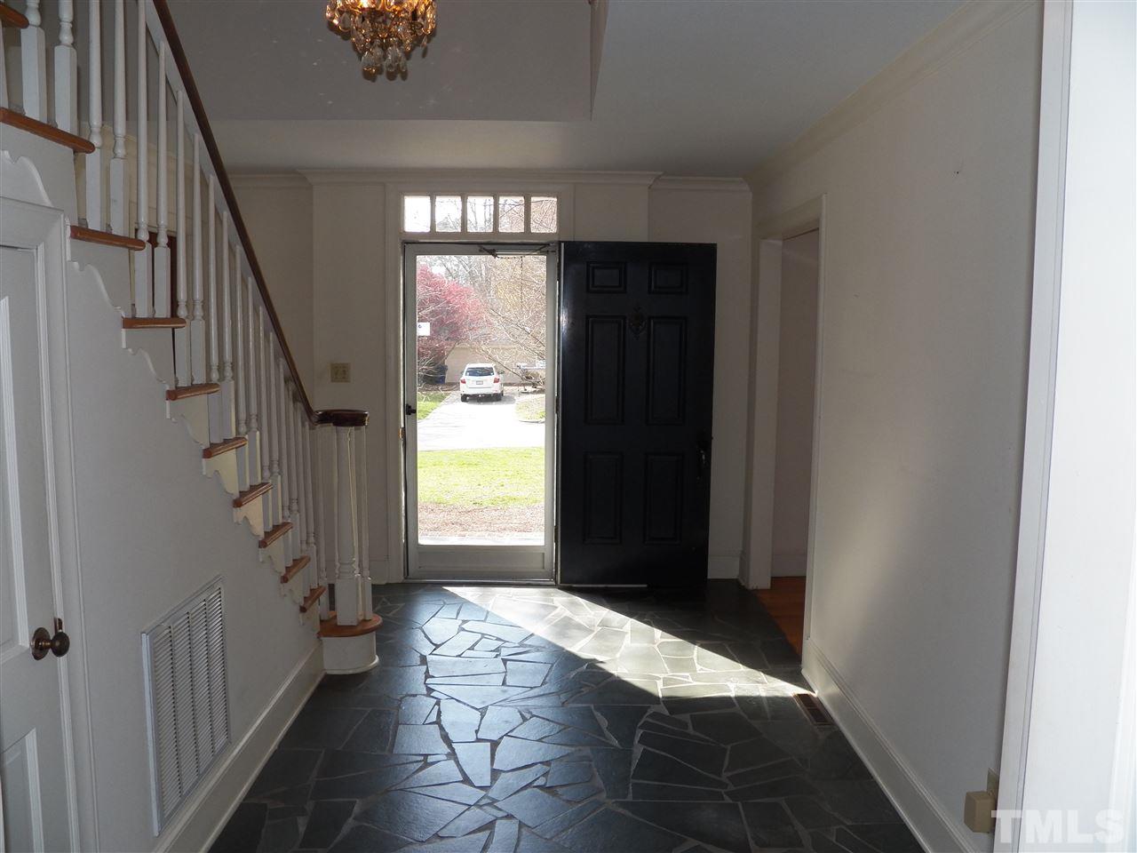 4704 Stiller Street Raleigh, NC 27609 - Photo 2 of 25 a view of entryway with window and stairs