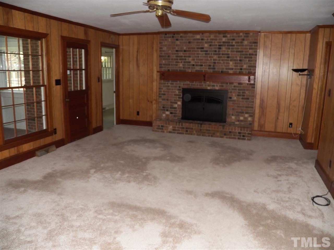 4704 Stiller Street Raleigh, NC 27609 - Photo 11 of 25 an empty room with windows