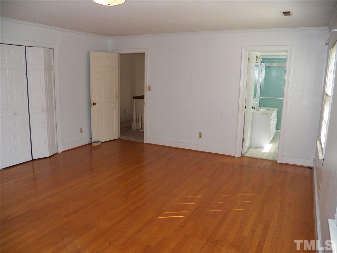 4704 Stiller Street Raleigh, NC 27609 - Photo 18 of 25 a view of an empty room