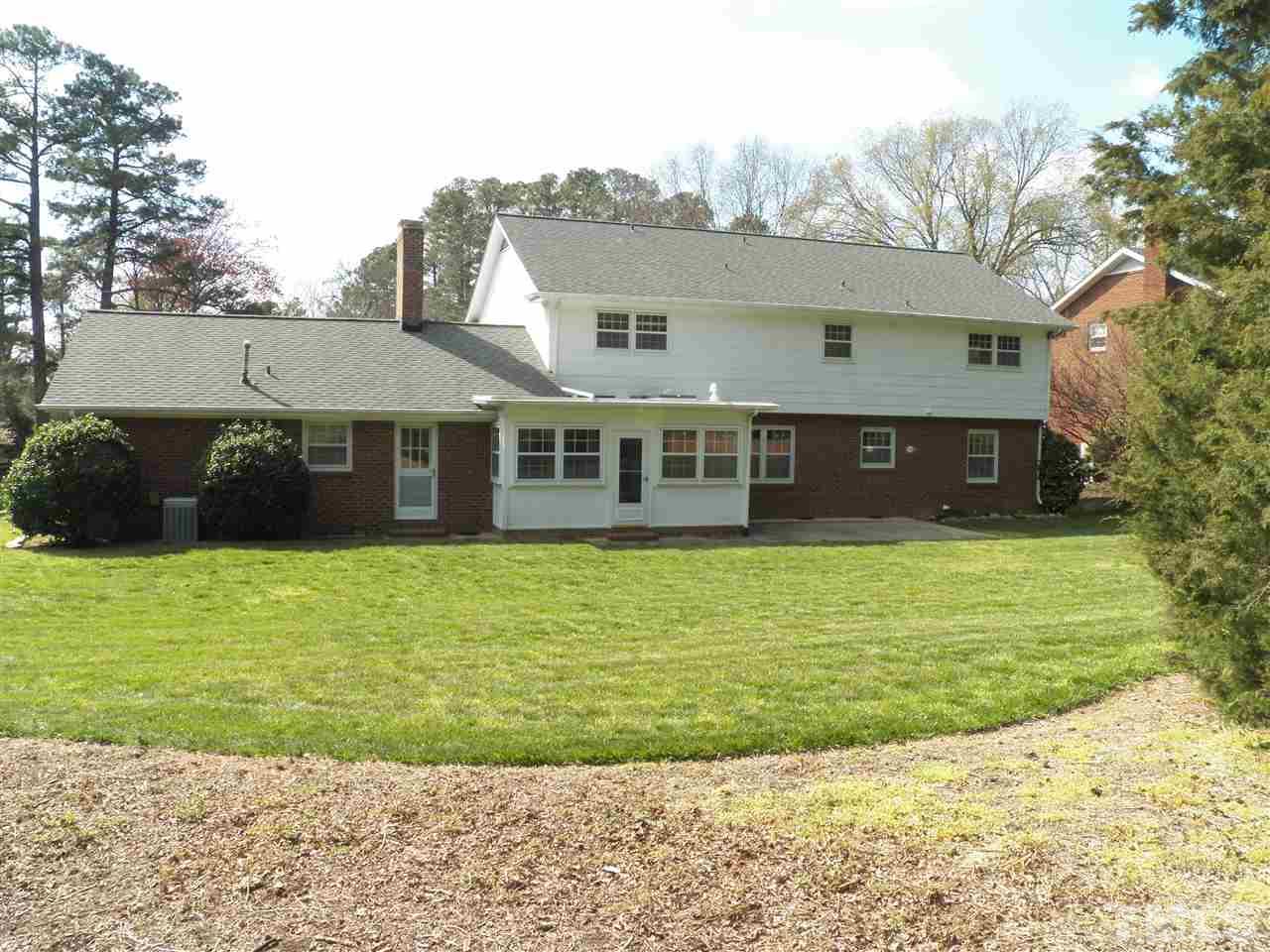 4704 Stiller Street Raleigh, NC 27609 - Photo 25 of 25 a front view of a house with a yard
