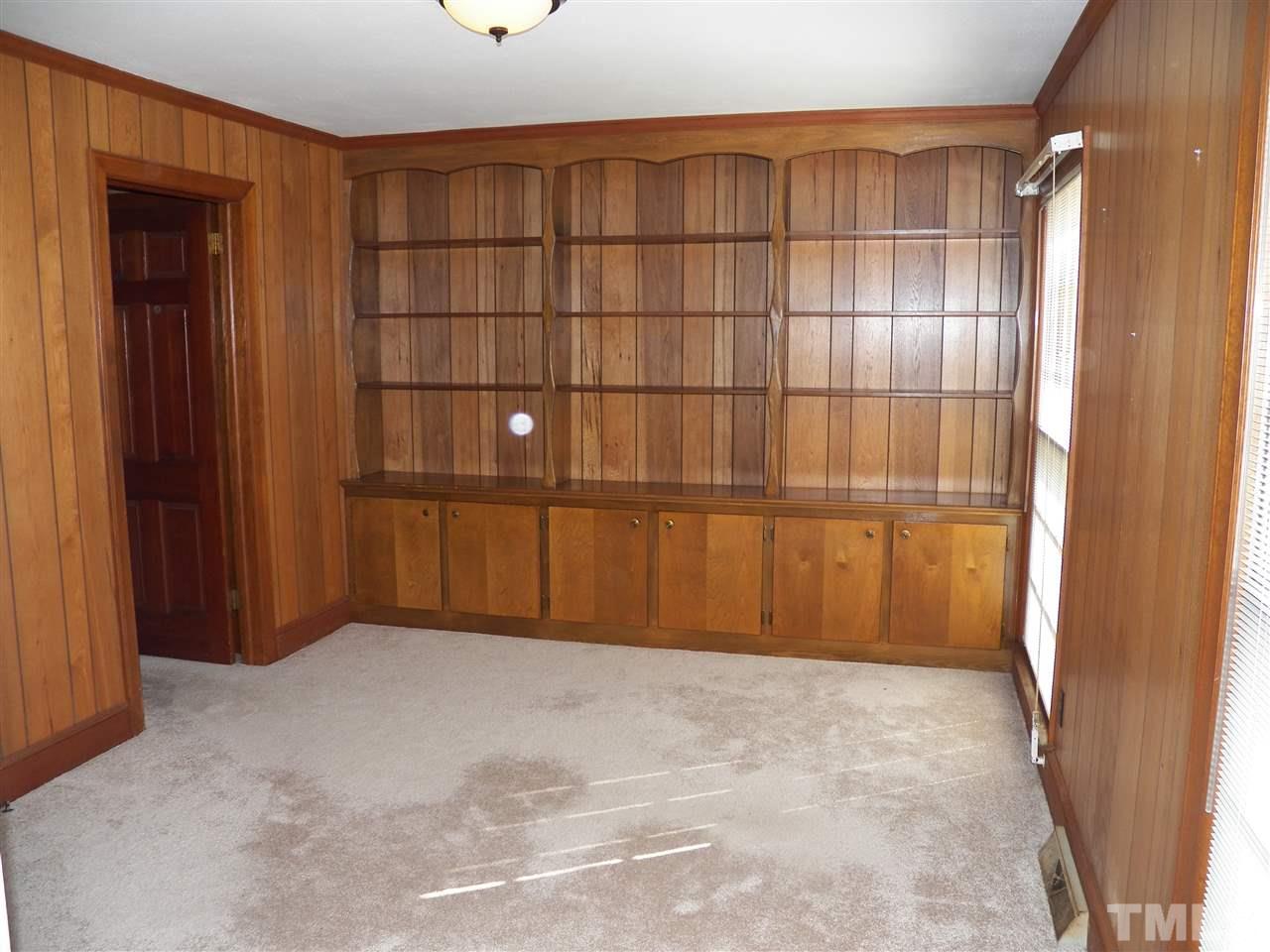 4704 Stiller Street Raleigh, NC 27609 - Photo 10 of 25 a view of wooden door
