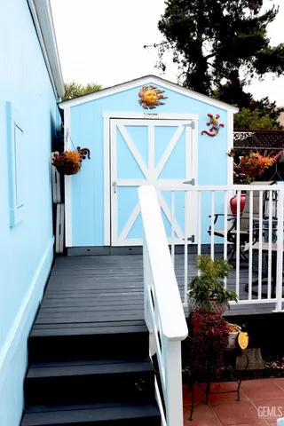 a view of balcony with furniture