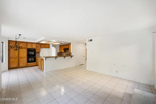 a view of a kitchen with a sink