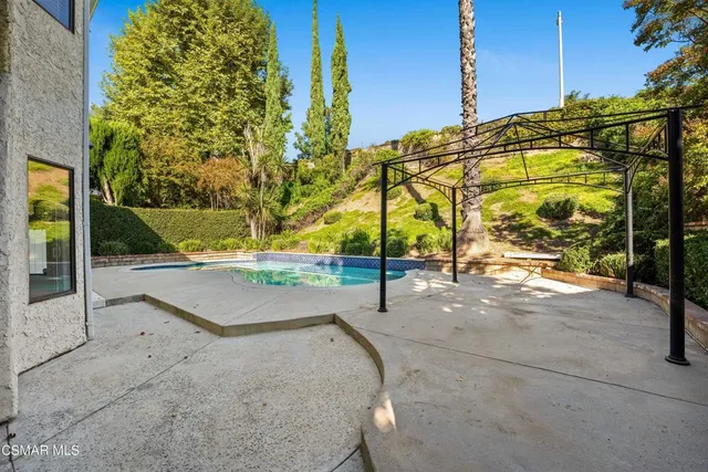 a view of a street with a building in the background