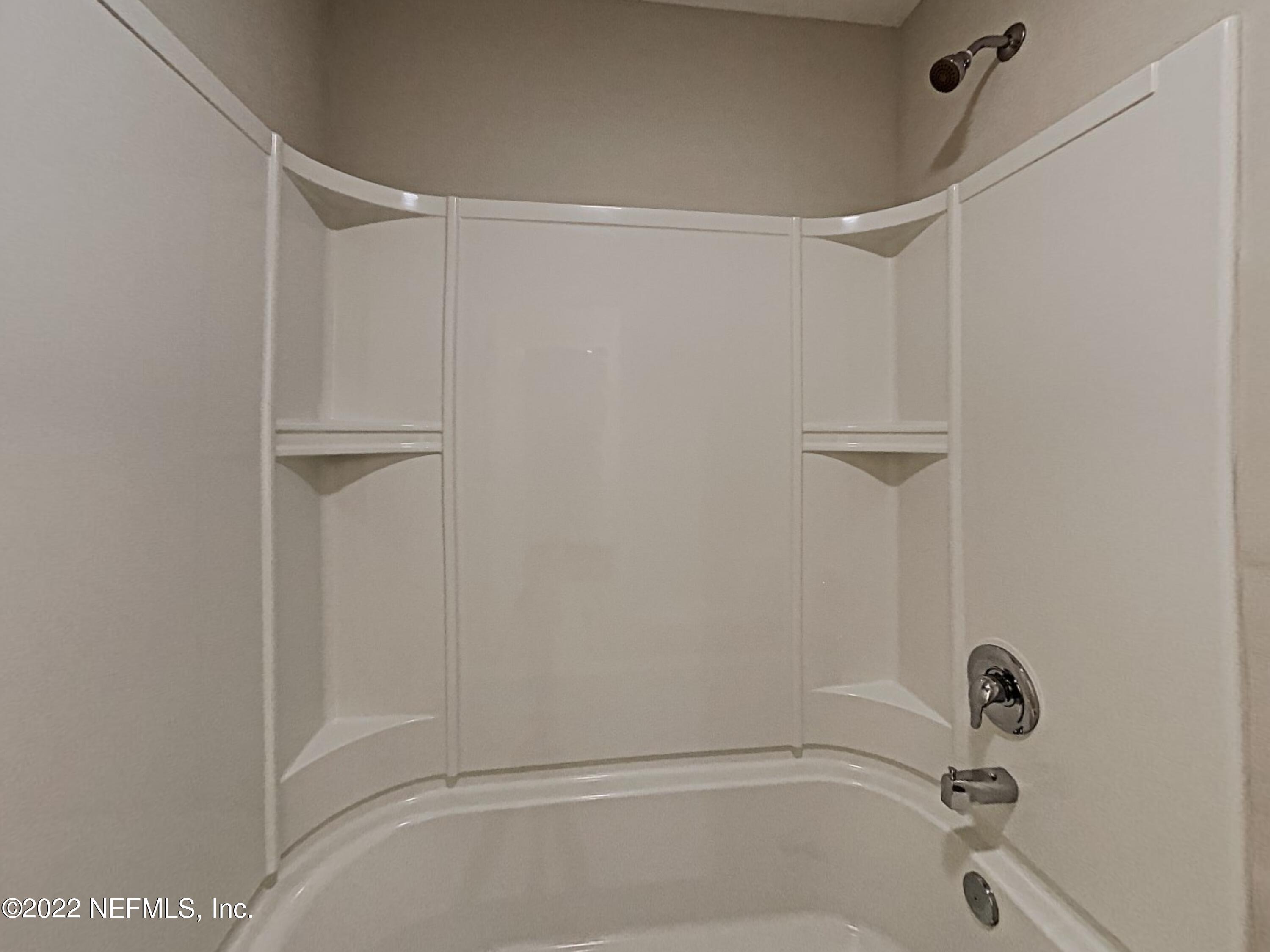 1562 Liberty Tree Place Jacksonville, FL 32221 - Photo 17 of 19 a bathroom with a shower