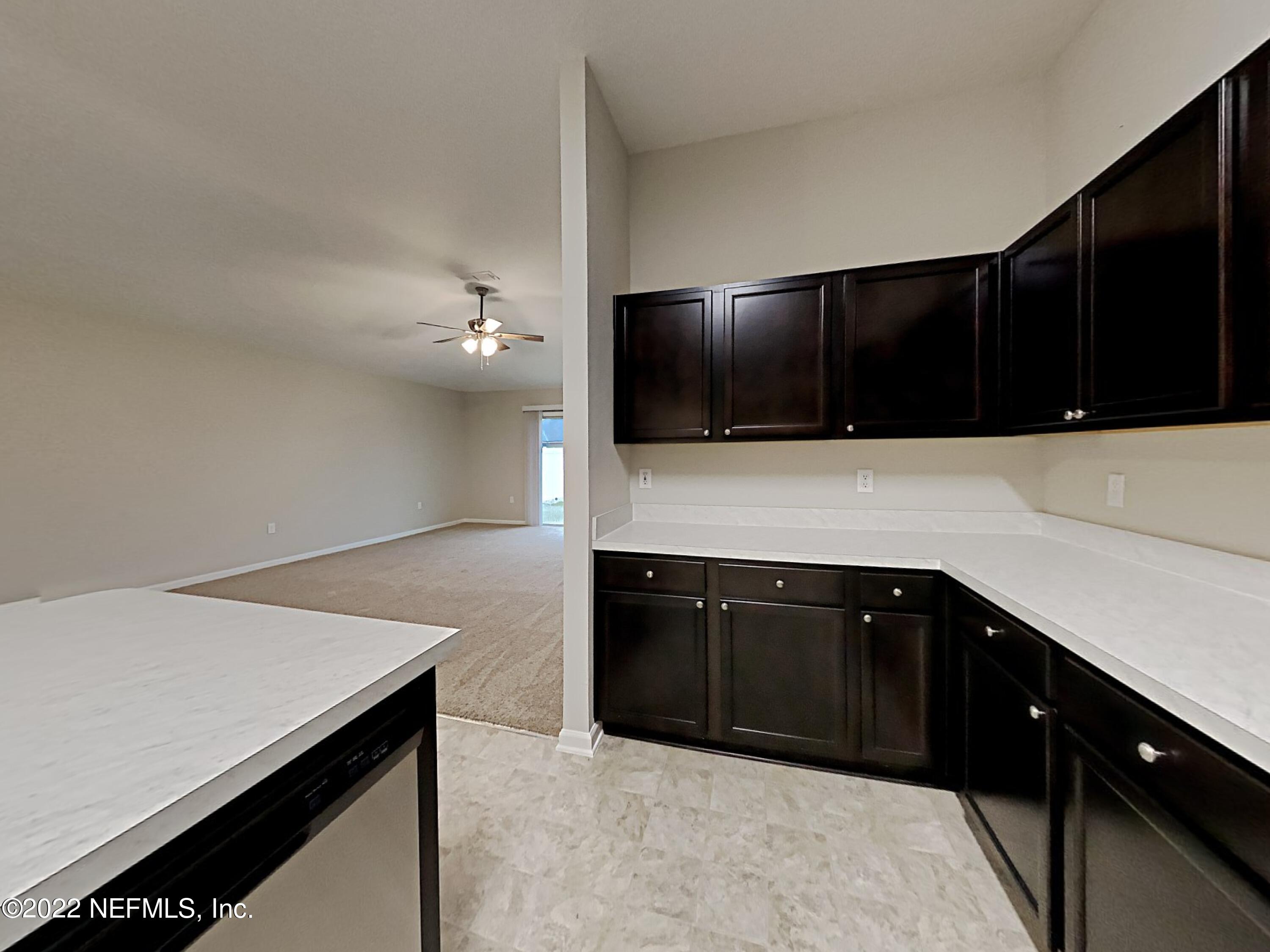 1562 Liberty Tree Place Jacksonville, FL 32221 - Photo 7 of 19 a kitchen with a sink and cabinets
