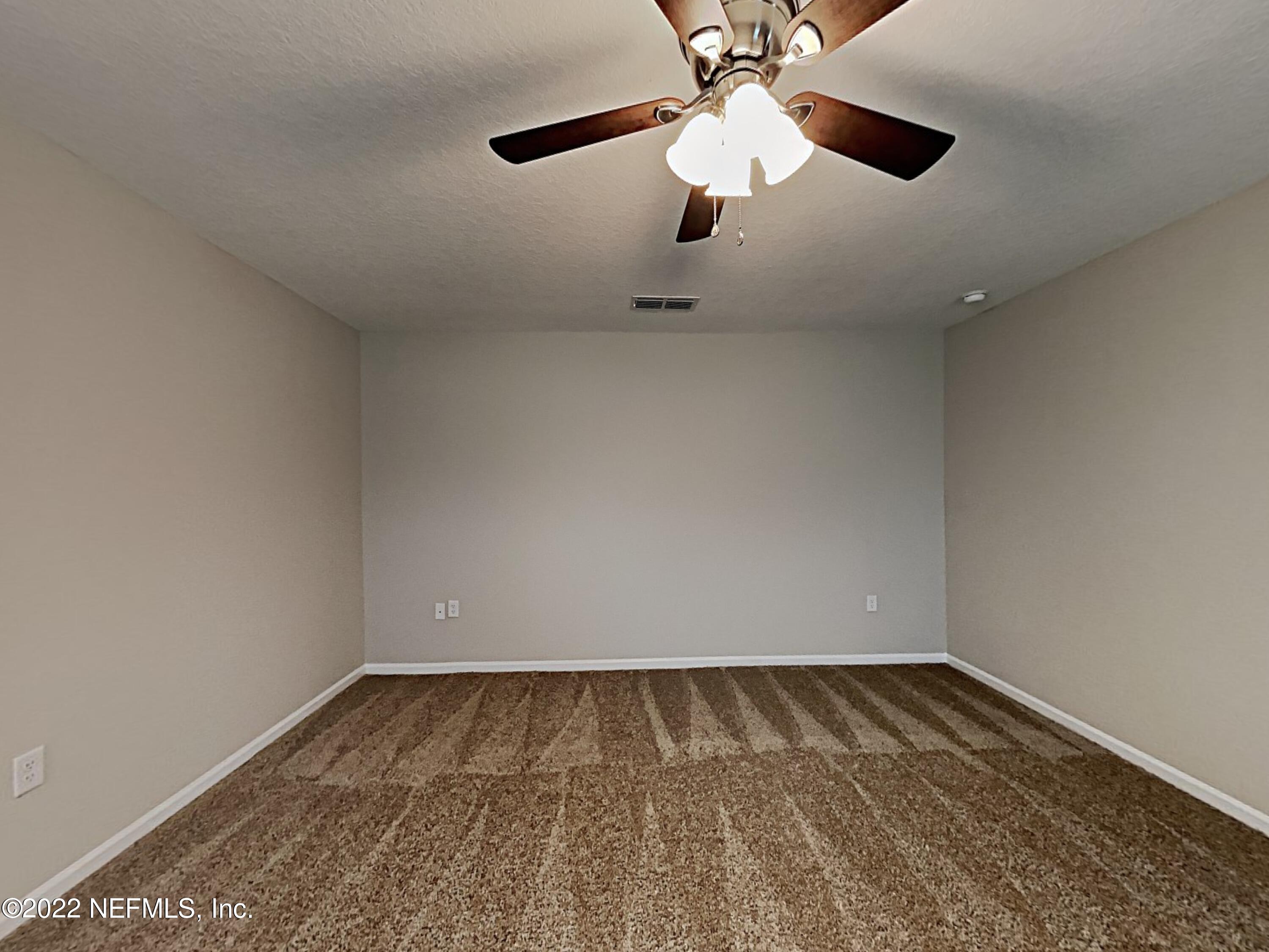 1562 Liberty Tree Place Jacksonville, FL 32221 - Photo 9 of 19 wooden floor in an empty room