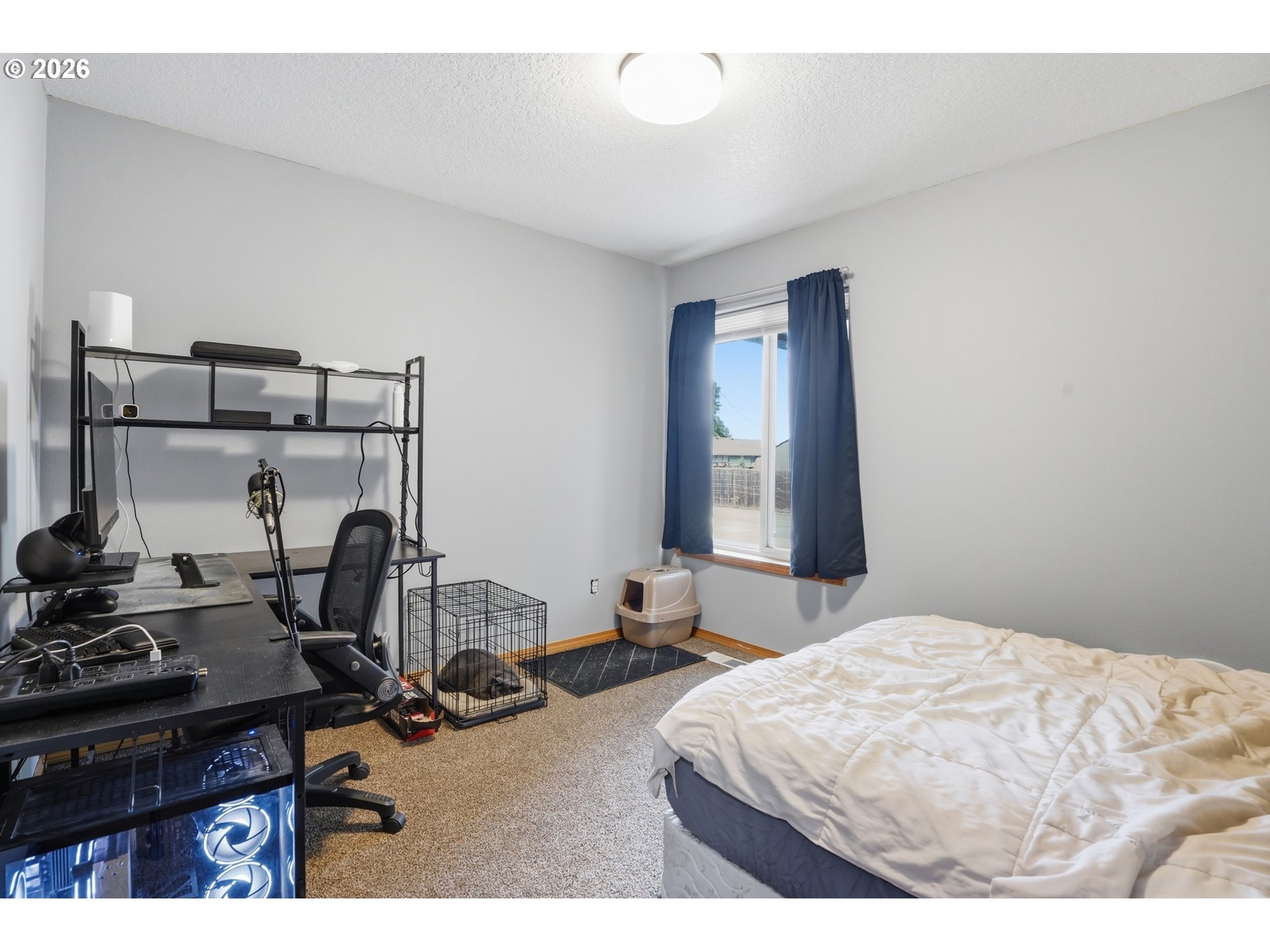 105 Toliver Road Molalla, OR 97038 - Photo 20 of 34 a bedroom with a bed and a table