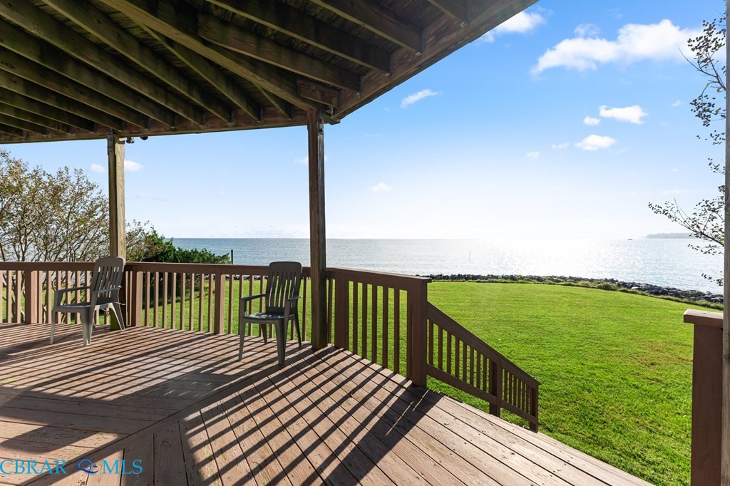 24 River Road Lottsburg, VA 22511 - Photo 10 of 35 a view of a balcony with wooden floor and outdoor space