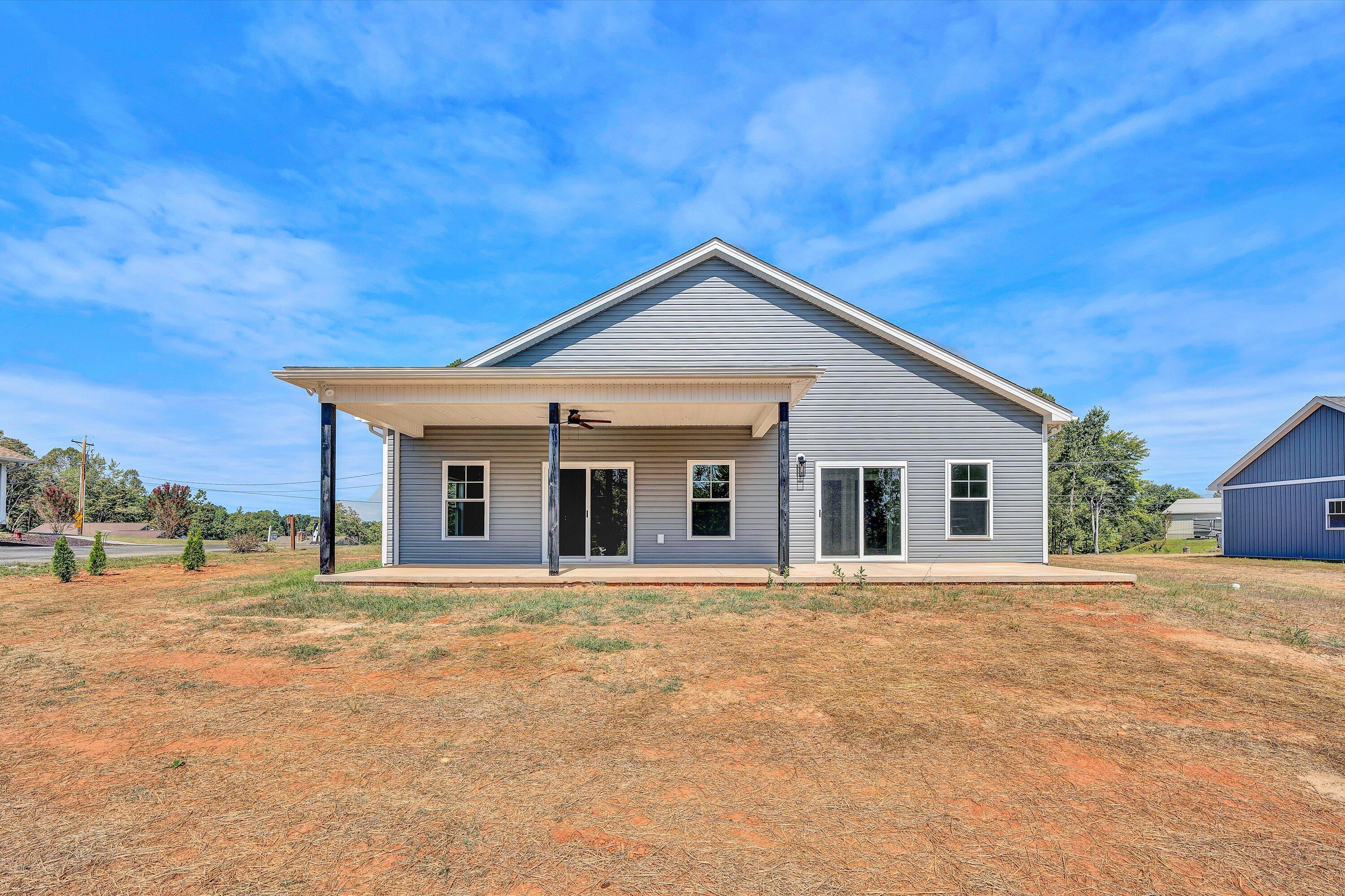 6450 Scruggs Road Moneta, VA 24121 - Photo 40 of 42 a front view of a house with a yard