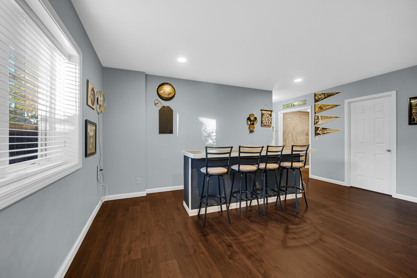 3429 East Sand Ridge Road Rolling Prairie, IN 46371 - Photo 12 of 25 a view of a dining room with furniture and window