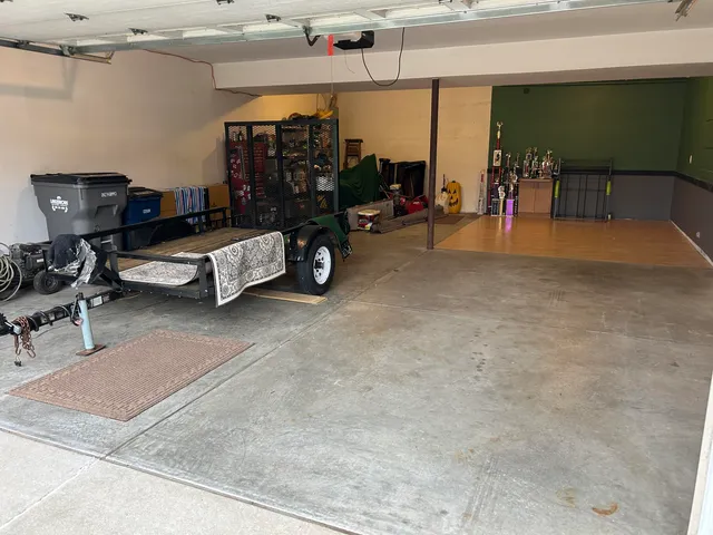 a living room with lots of furniture and gym equipment