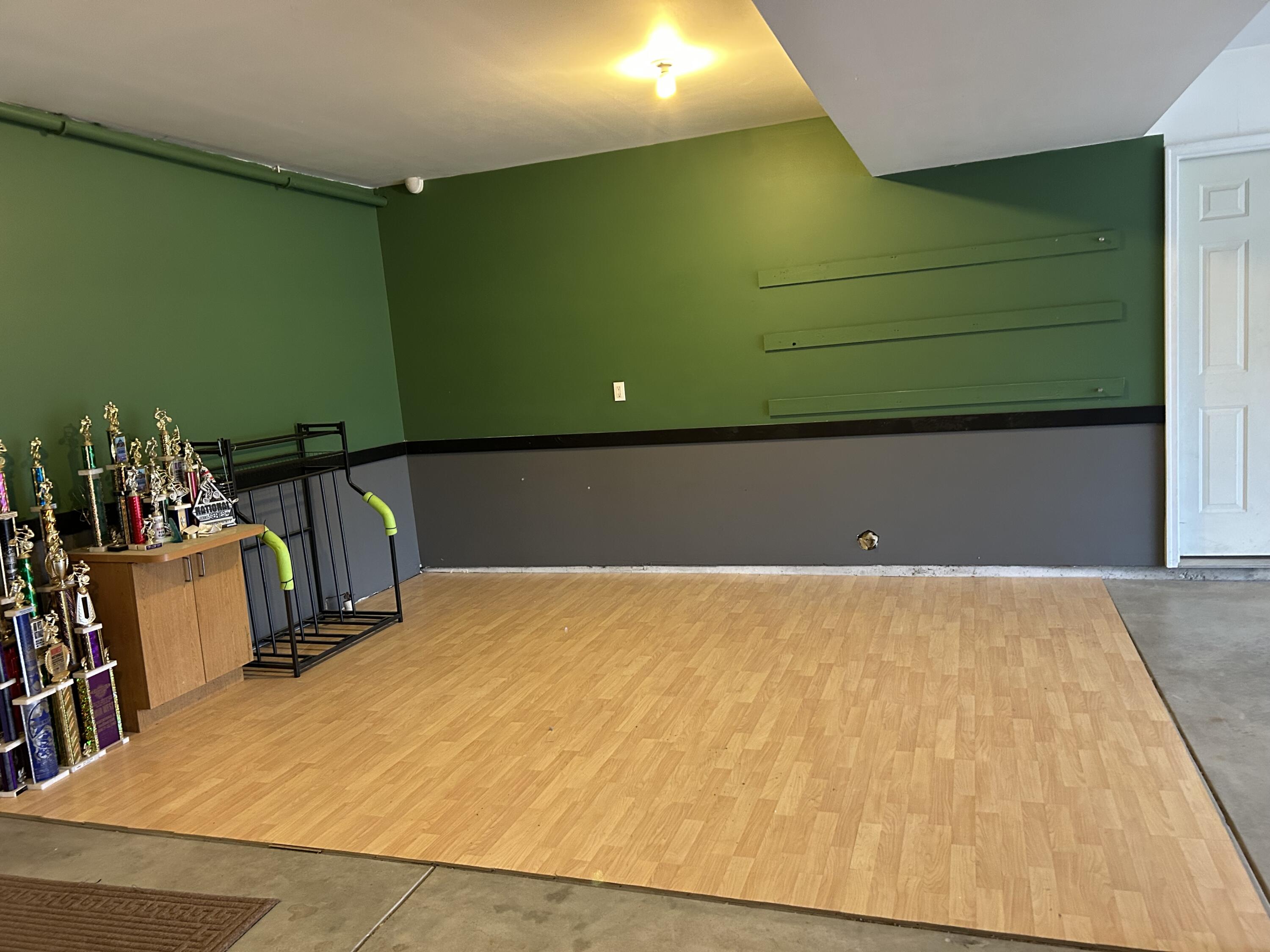3429 East Sand Ridge Road Rolling Prairie, IN 46371 - Photo 22 of 25 a view of a room with shelves
