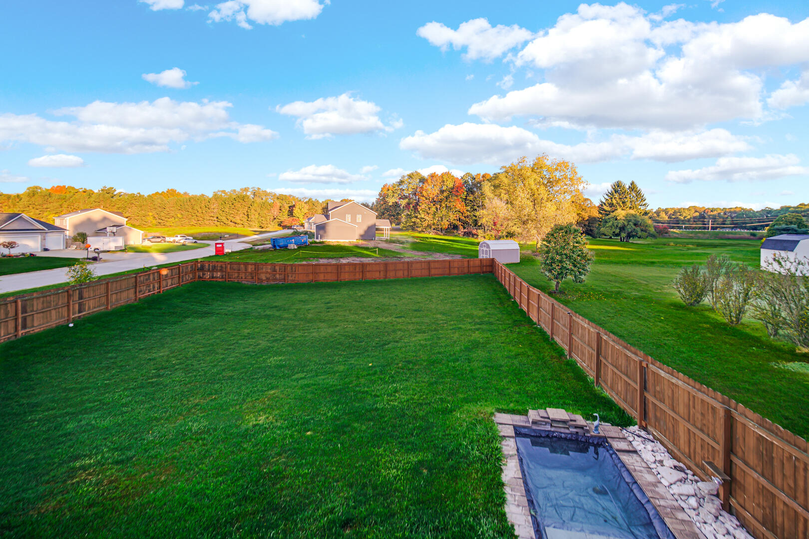3429 East Sand Ridge Road Rolling Prairie, IN 46371 - Photo 24 of 25 a view of a terrace with a garden