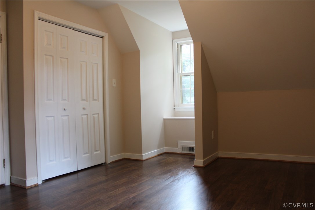 4718 Newbys Bridge Road Chesterfield, VA 23832 - Photo 11 of 15 an empty room with wooden floor and windows