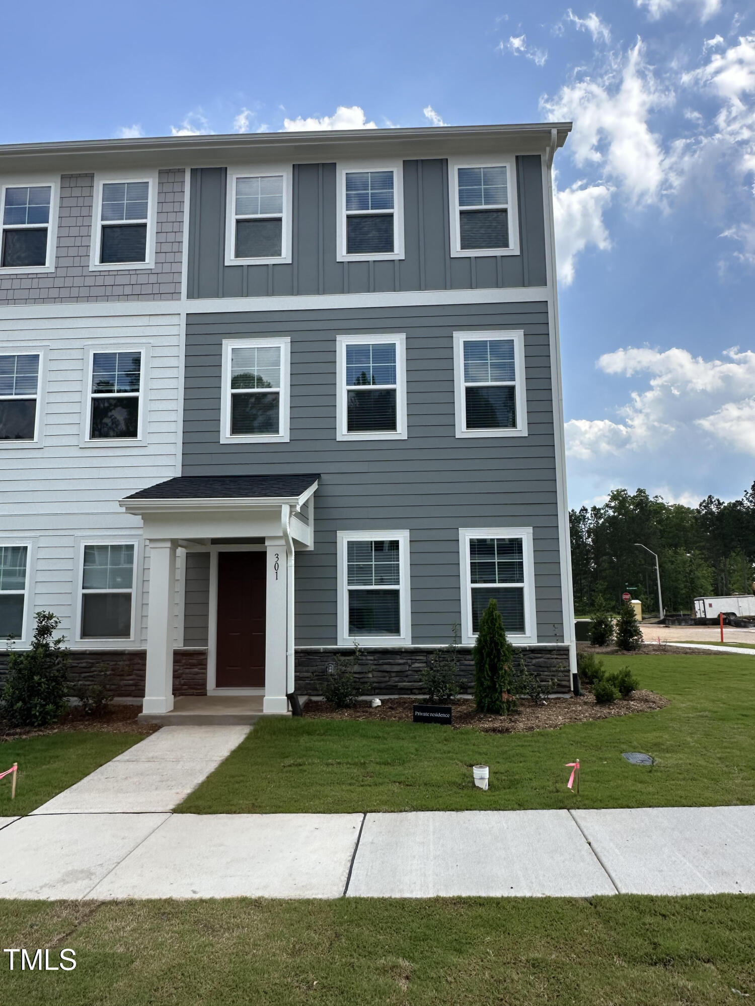301 Deercroft Drive Apex, NC 27539 - Photo 2 of 33 a front view of a house with a yard
