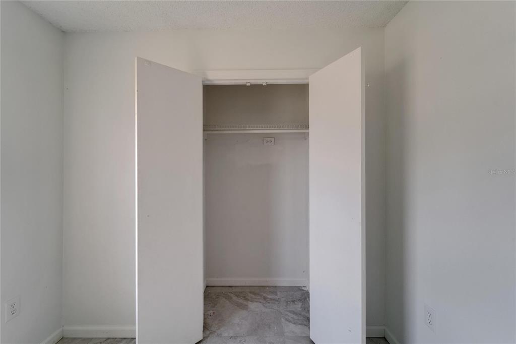 8818 Ashman Road Riverview, FL 33578 - Photo 19 of 26 a view of closet area