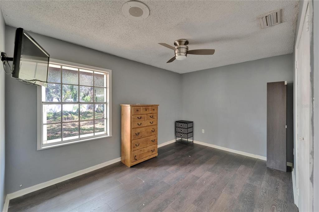 8818 Ashman Road Riverview, FL 33578 - Photo 22 of 26 a view of an empty room with a window