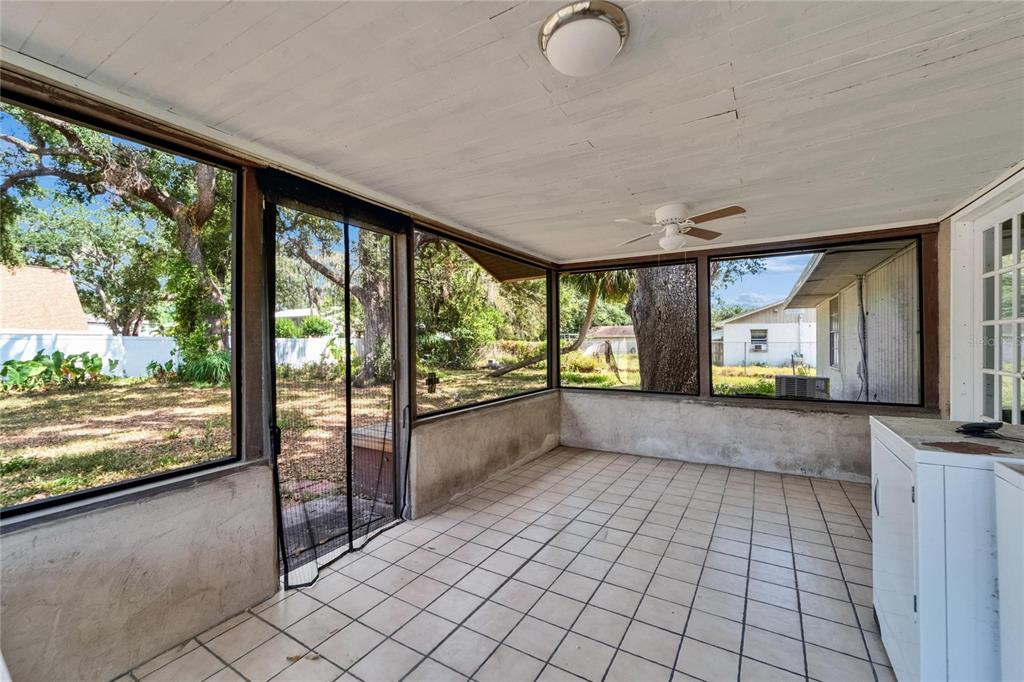 8818 Ashman Road Riverview, FL 33578 - Photo 26 of 26 a view of empty room with wooden floor and fan