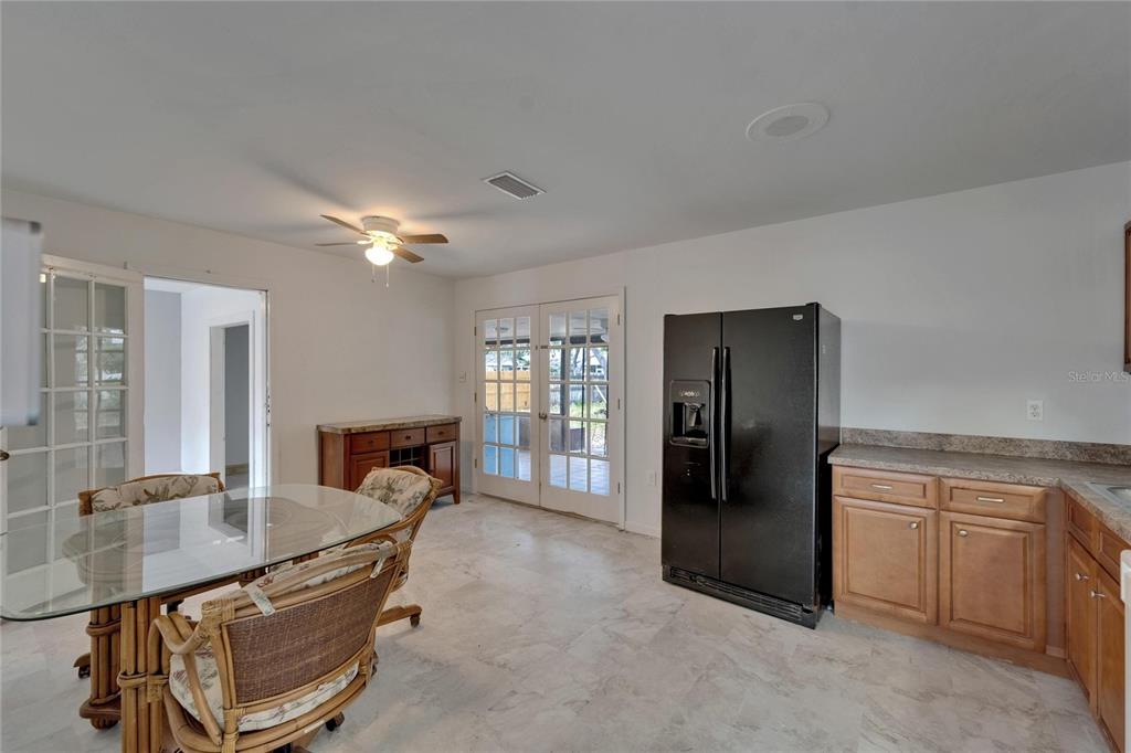 8818 Ashman Road Riverview, FL 33578 - Photo 10 of 26 a living room with furniture and a table