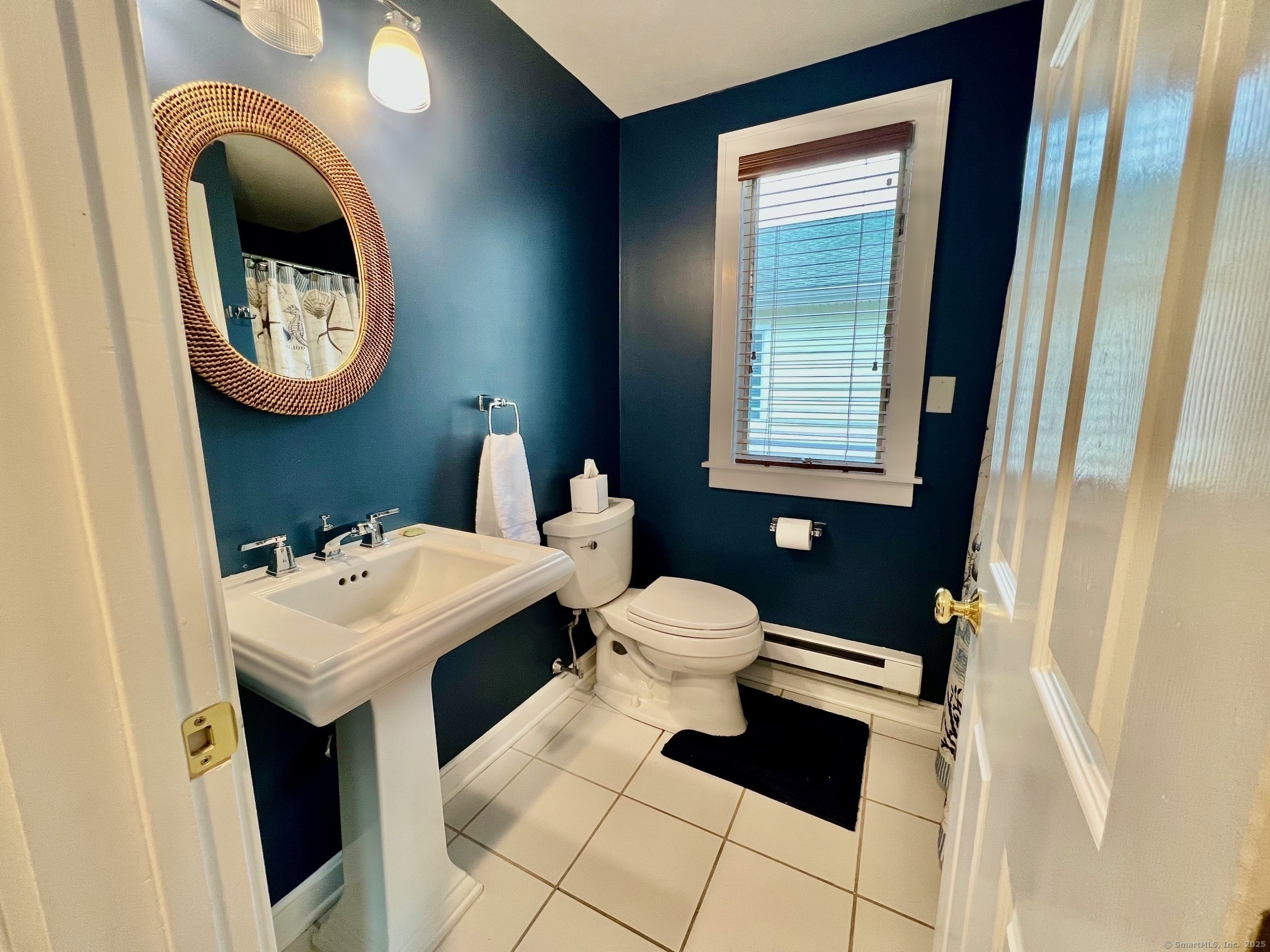 23 Linden Lane Madison, CT 06443 - Photo 13 of 30 First floor full bathroom with stall shower.