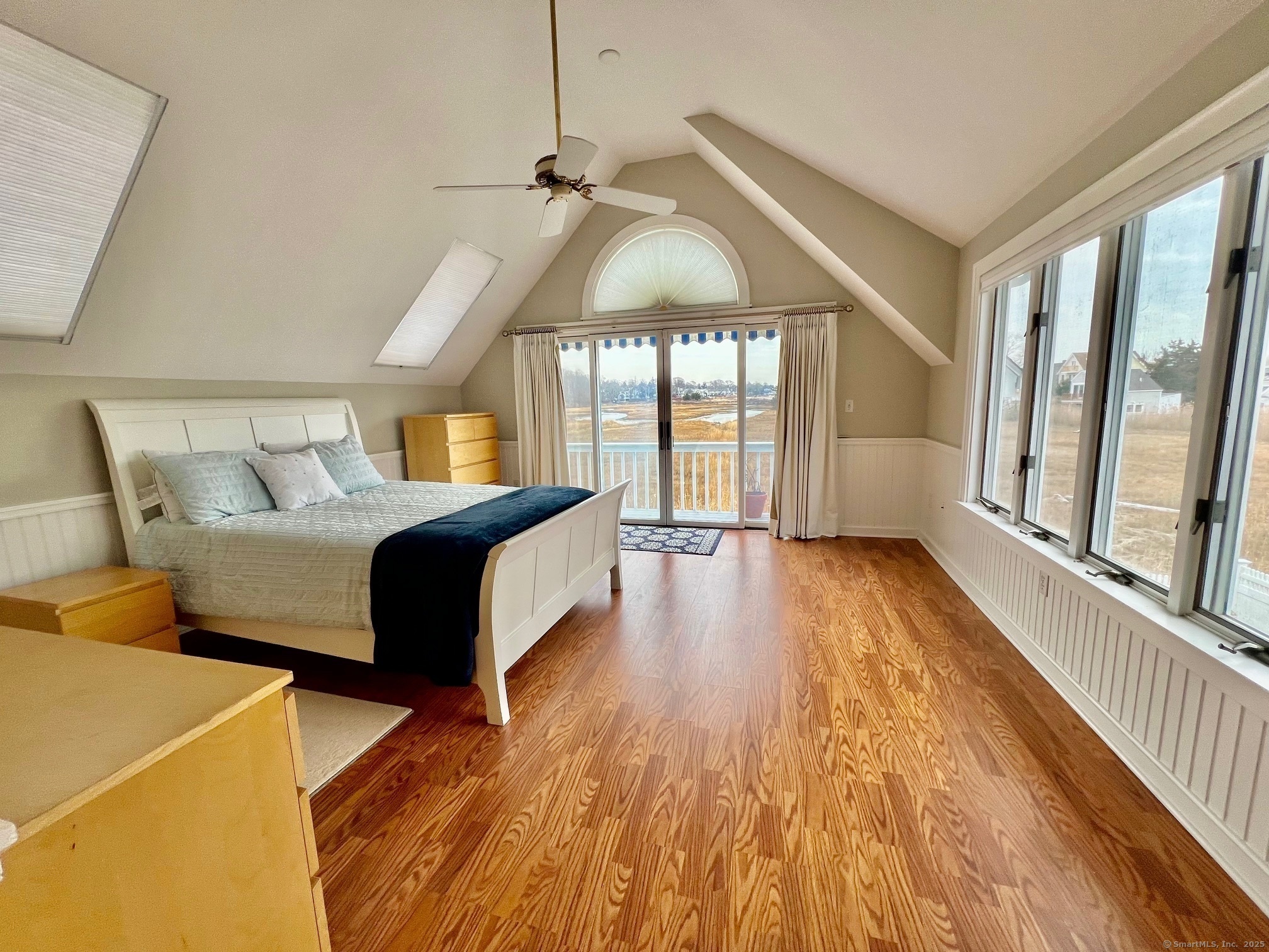 23 Linden Lane Madison, CT 06443 - Photo 15 of 30 Beautiful, airy primary bedroom overlooking the marsh.