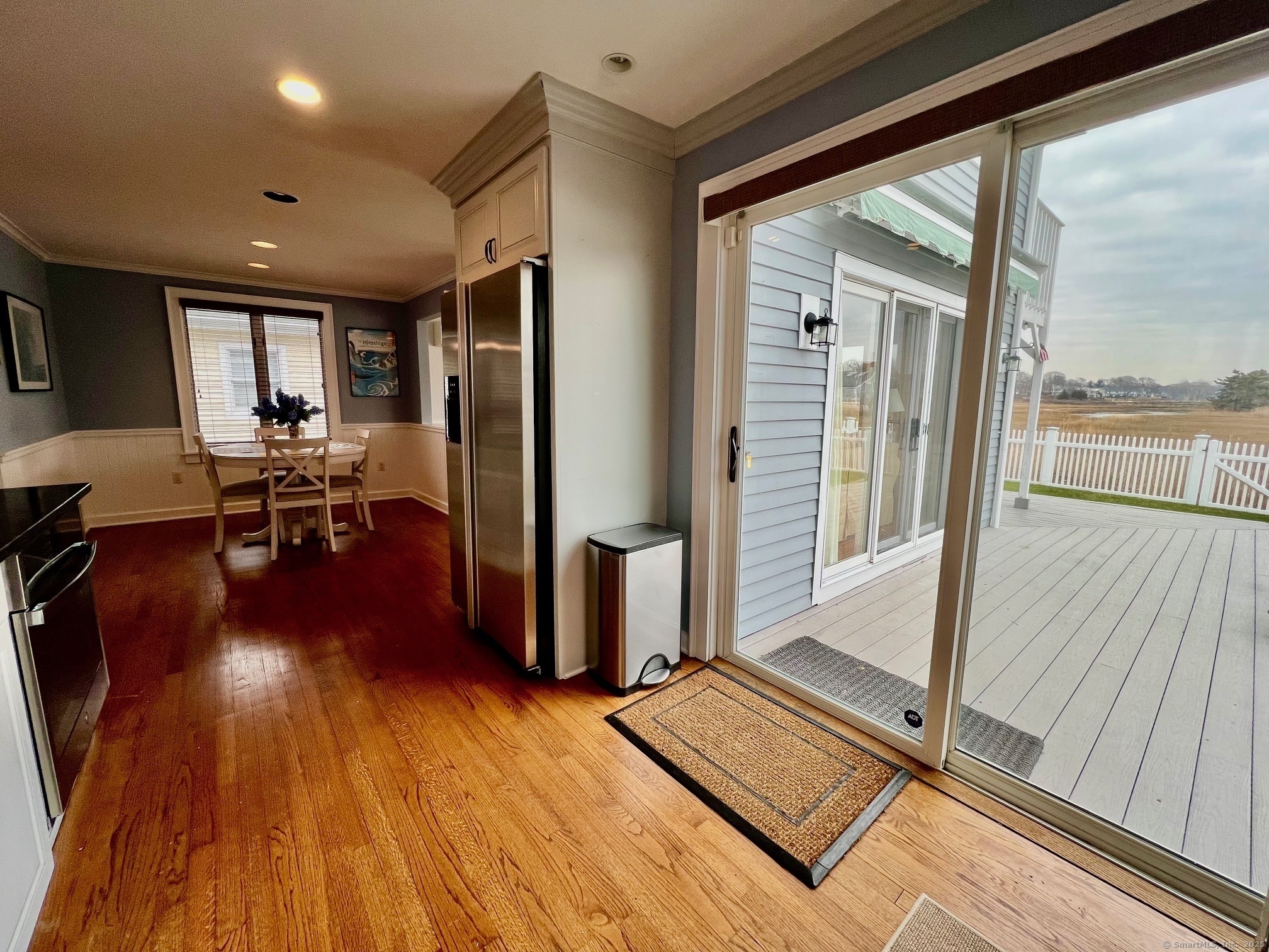 23 Linden Lane Madison, CT 06443 - Photo 8 of 30 Slider off of the kitchen to the rear deck