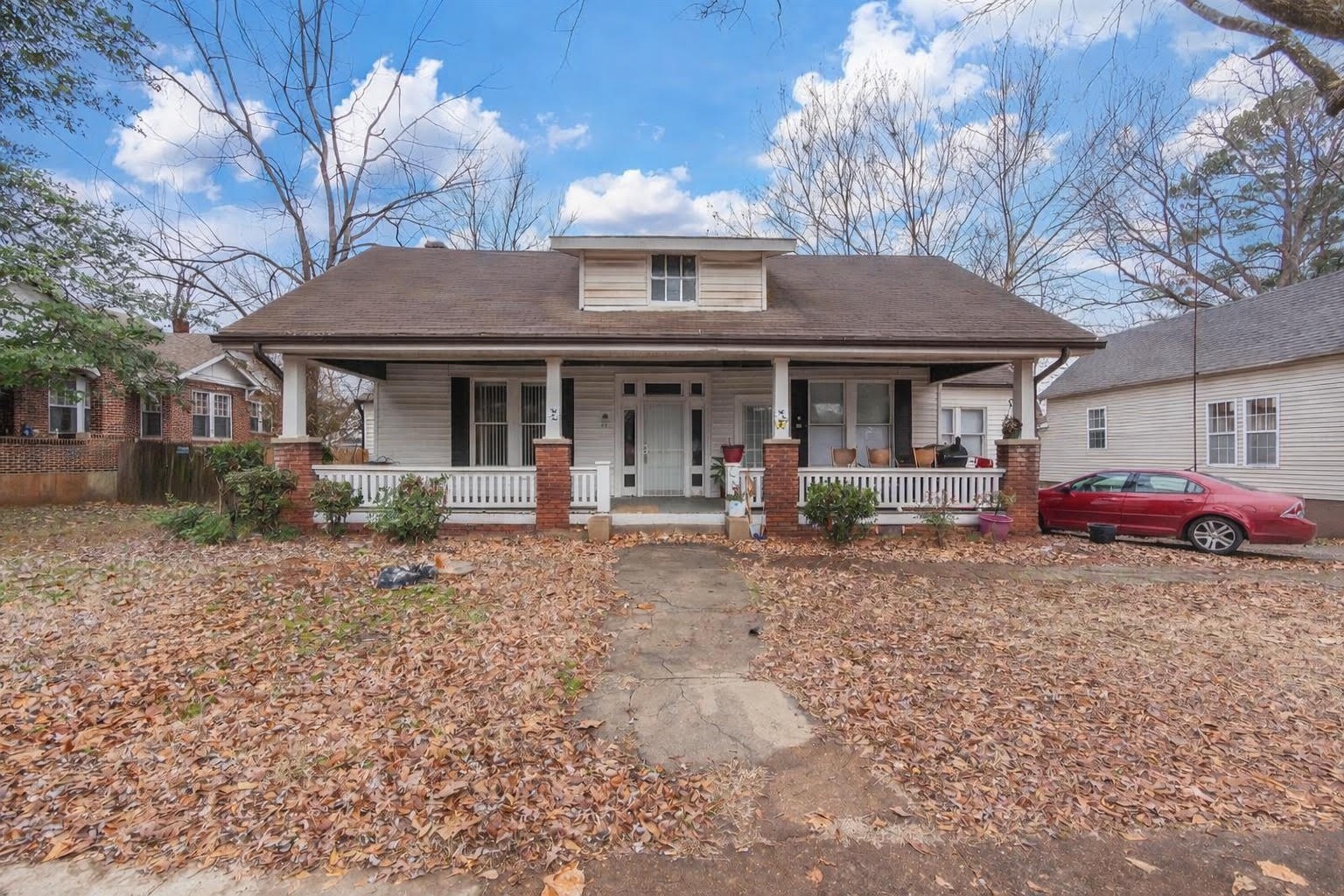 203 South Fairgrounds Street Jackson, TN 38301 - Photo 13 of 13 a front view of a house with garden