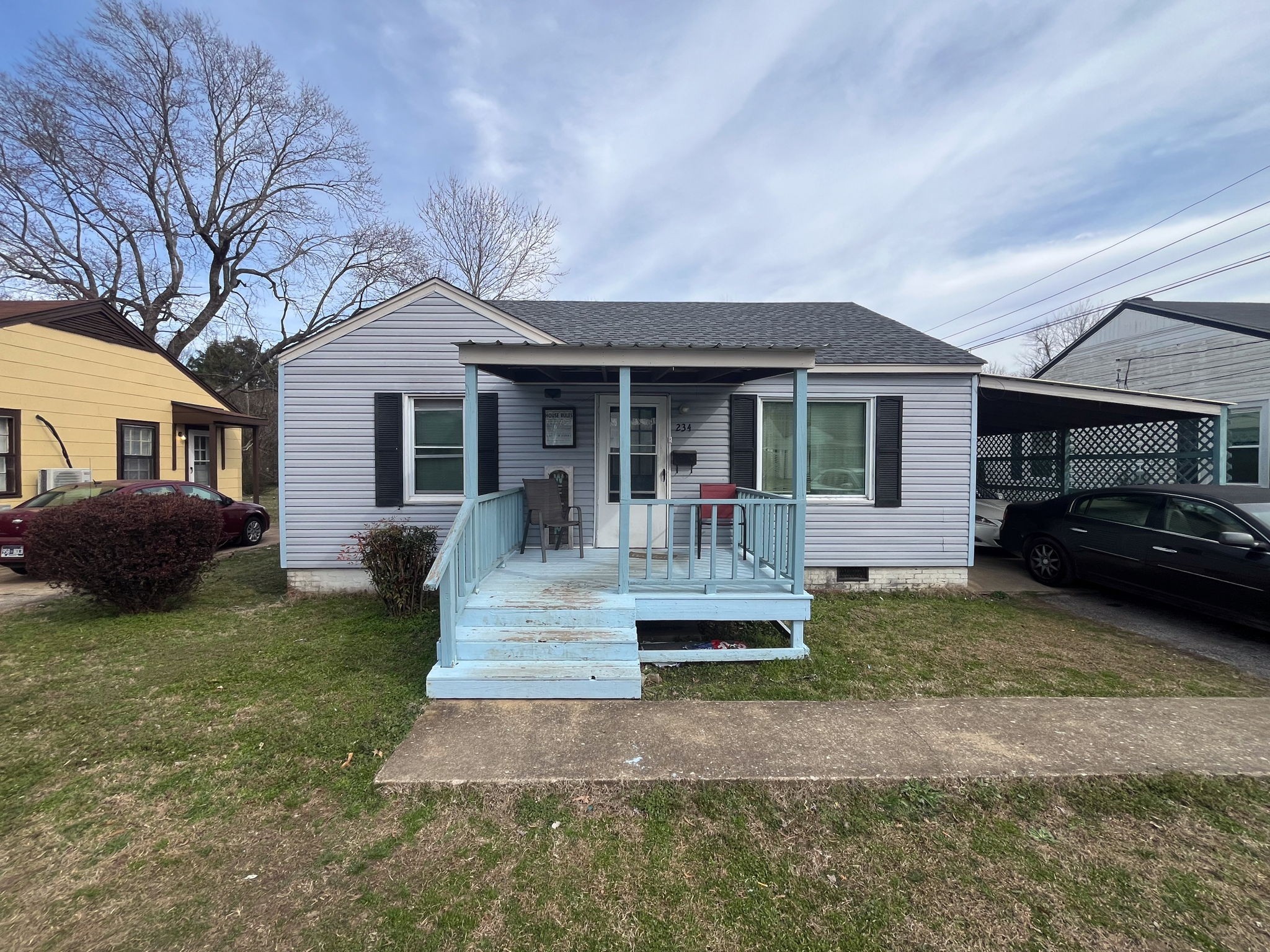 203 South Fairgrounds Street Jackson, TN 38301 - Photo 2 of 13 a view of house and yard with swimming pool and furniture