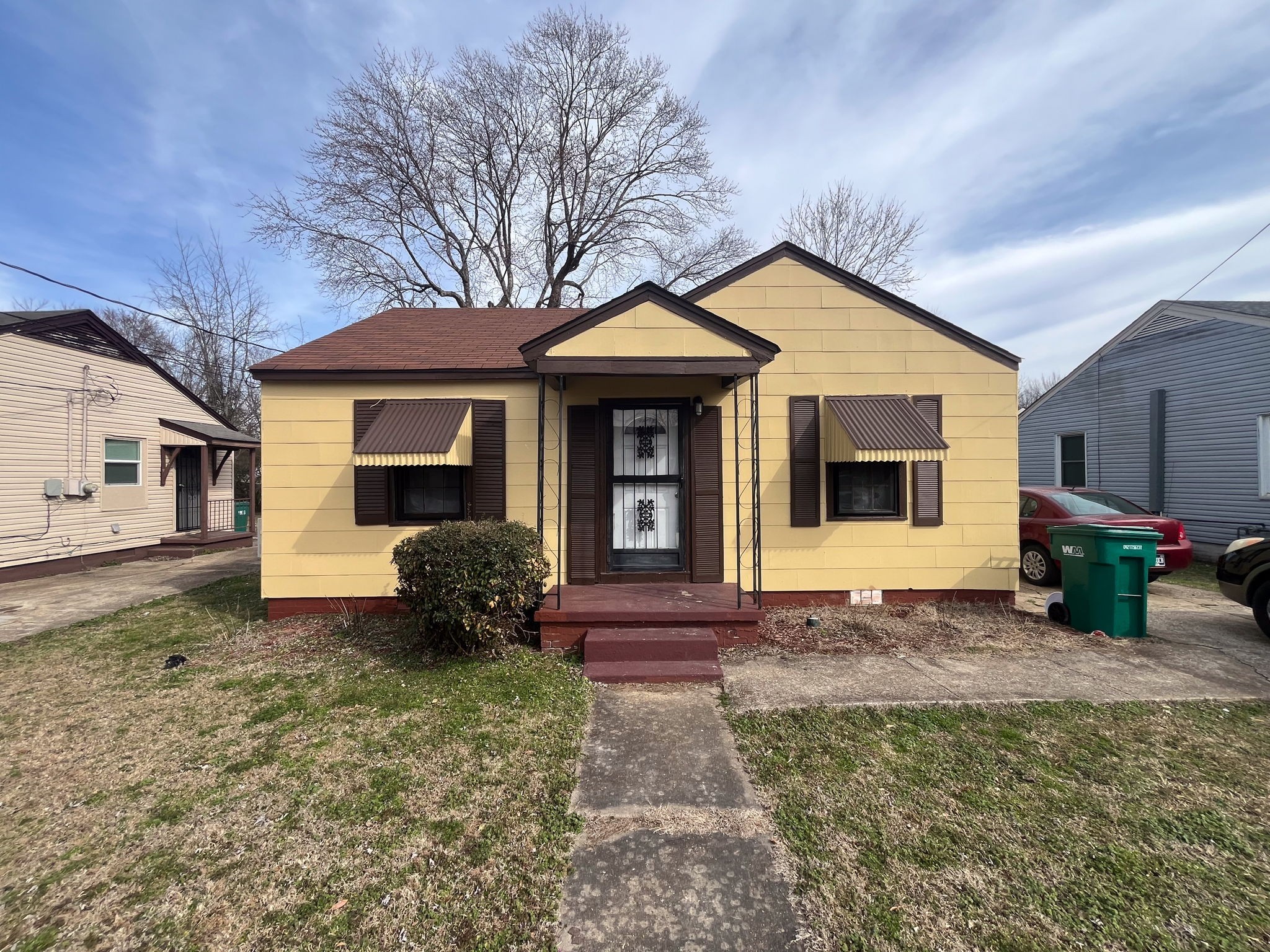 203 South Fairgrounds Street Jackson, TN 38301 - Photo 3 of 13 a front view of a house with garden