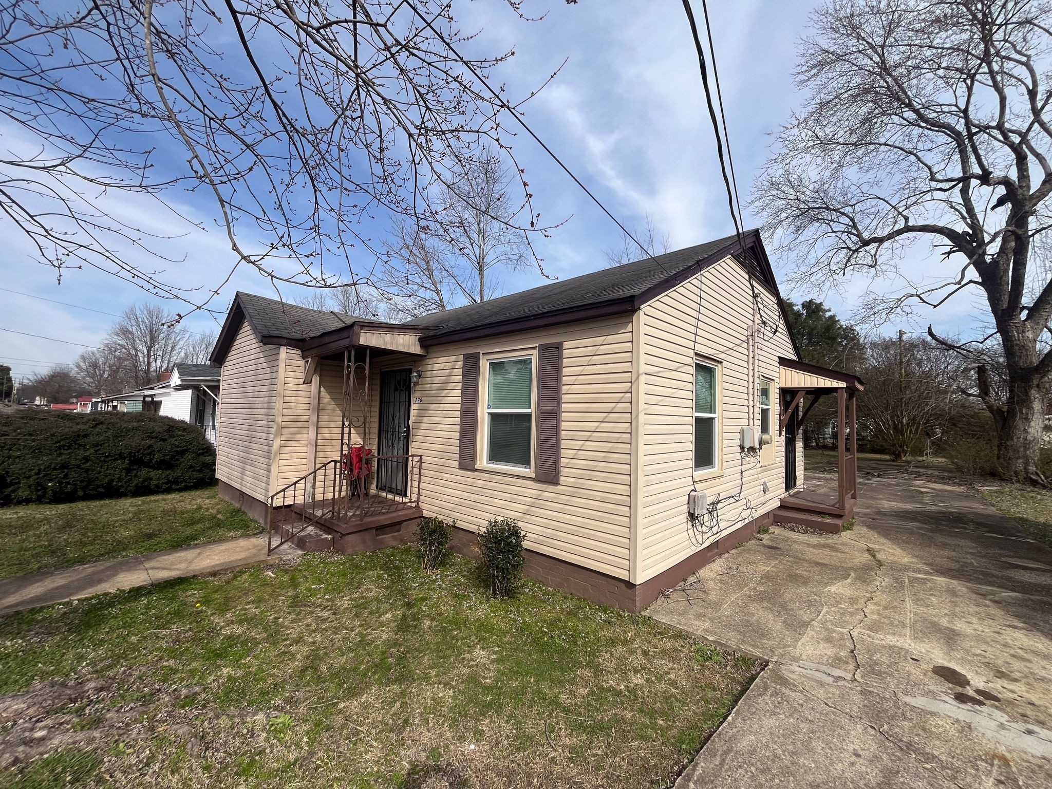 203 South Fairgrounds Street Jackson, TN 38301 - Photo 4 of 13 a view of a house with a yard