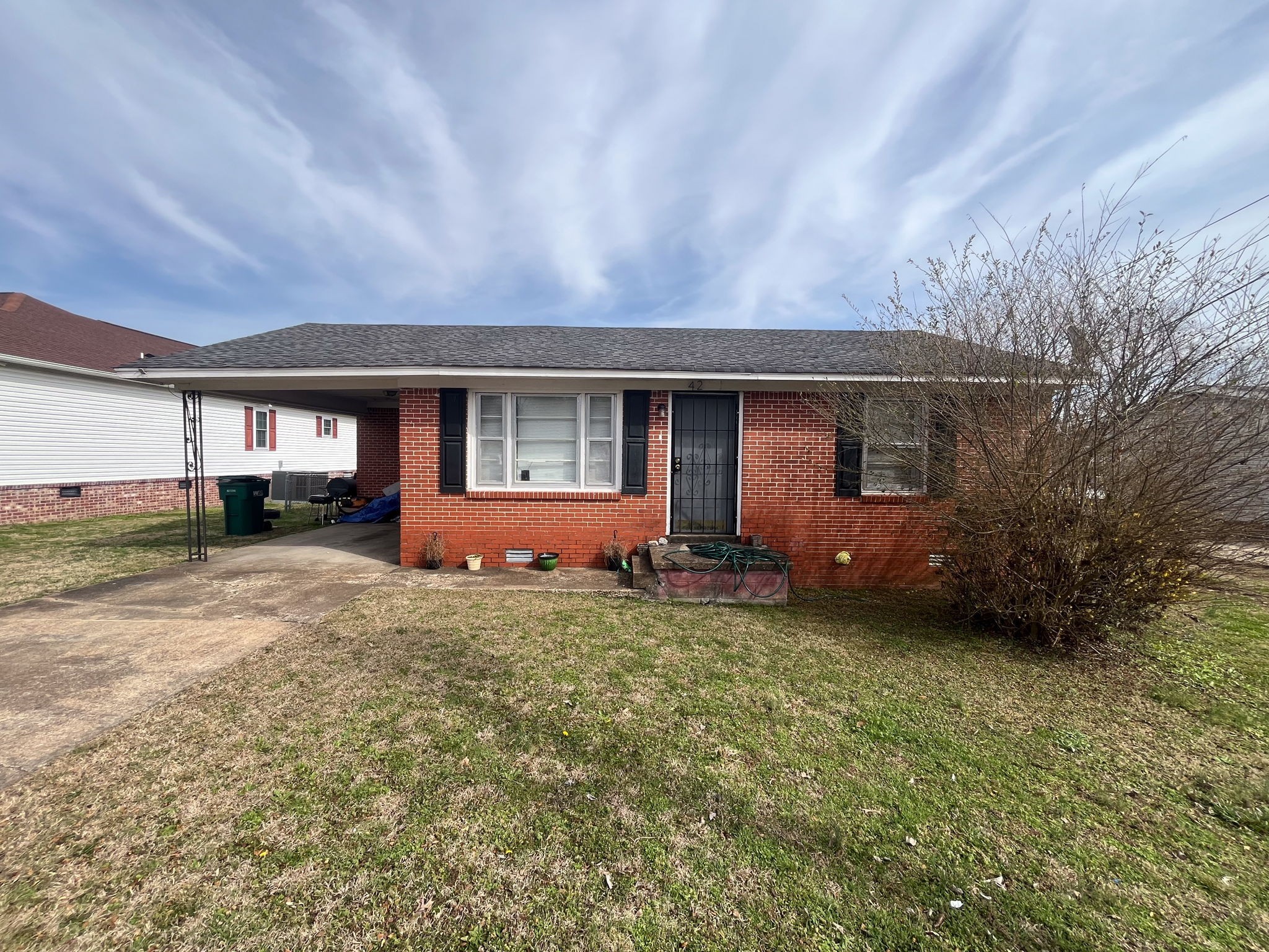 203 South Fairgrounds Street Jackson, TN 38301 - Photo 5 of 13 a house view with a garden space
