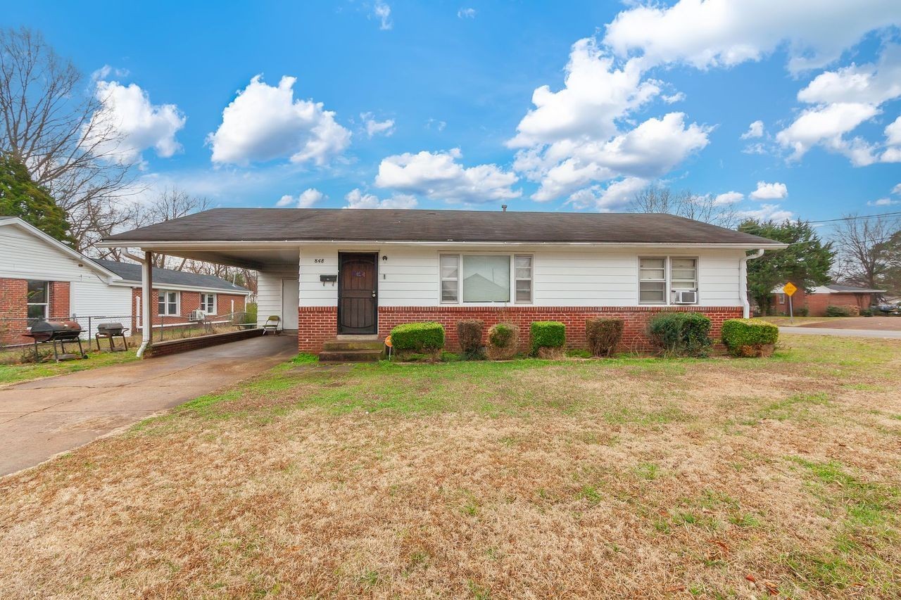 203 South Fairgrounds Street Jackson, TN 38301 - Photo 9 of 13 a front view of house with yard and entertaining space