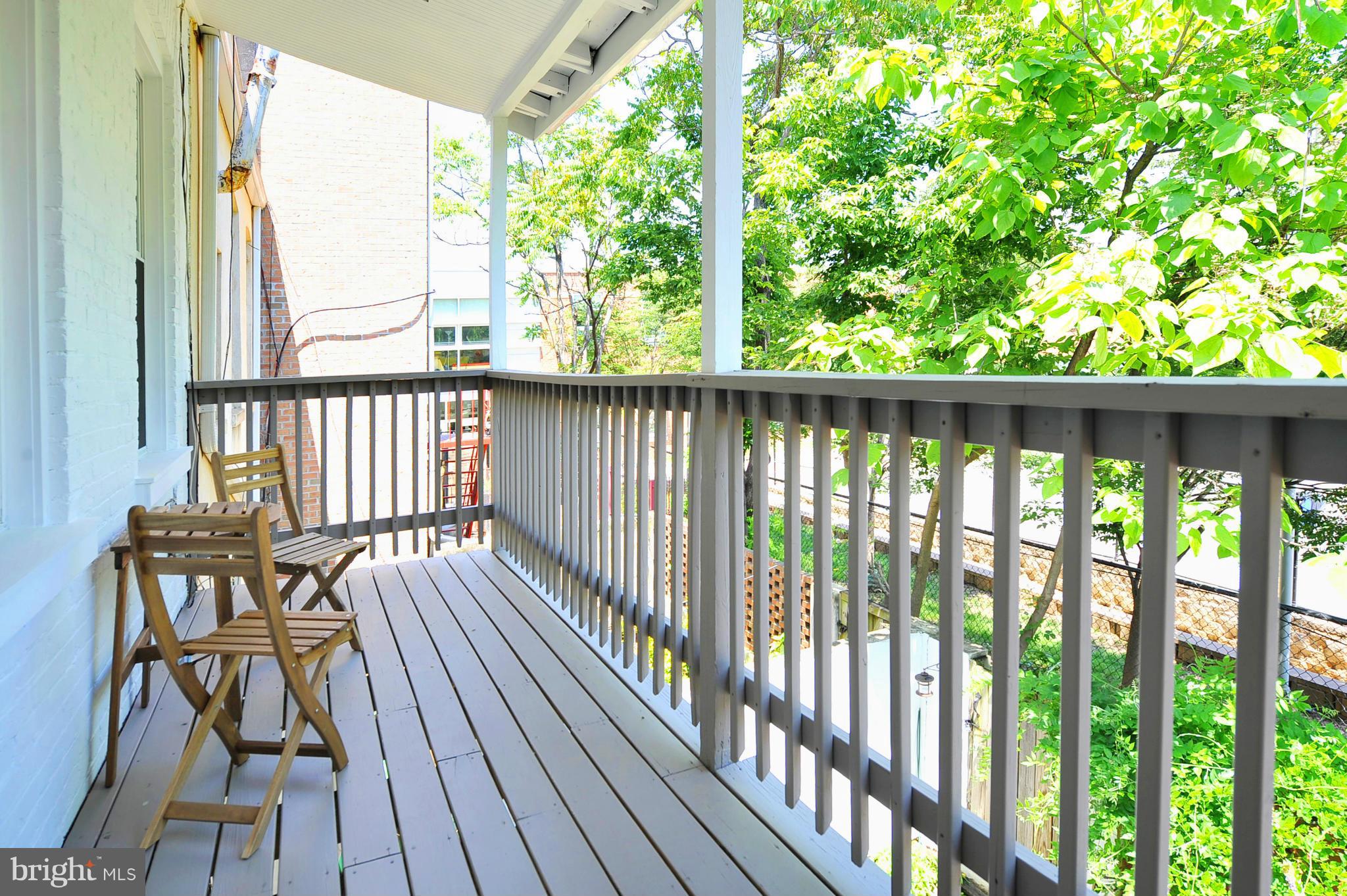 2509 17th Street Northwest, Unit 3 Washington, DC 20009 - Photo 16 of 27 a view of balcony with wooden floor