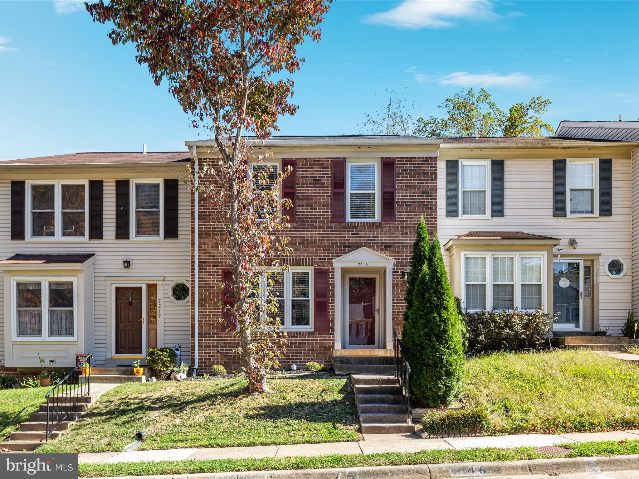 7219 Kousa Lane Springfield, VA 22152 - Photo 1 of 34 front view of house with a yard