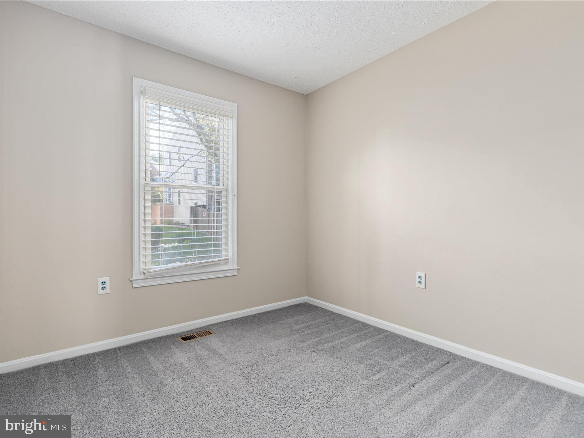 7219 Kousa Lane Springfield, VA 22152 - Photo 12 of 34 an empty room with a window