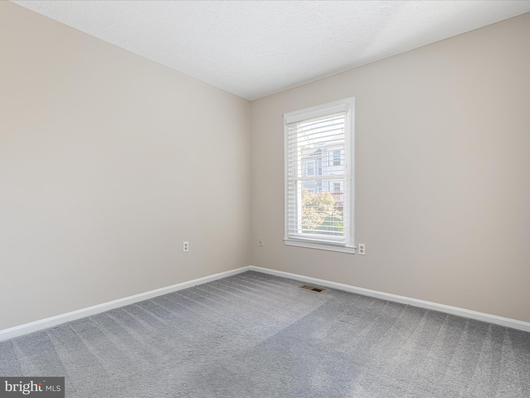 7219 Kousa Lane Springfield, VA 22152 - Photo 13 of 34 an empty room with a window