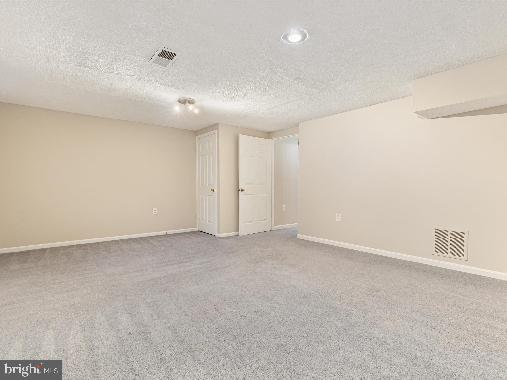 7219 Kousa Lane Springfield, VA 22152 - Photo 21 of 34 a view of an empty room